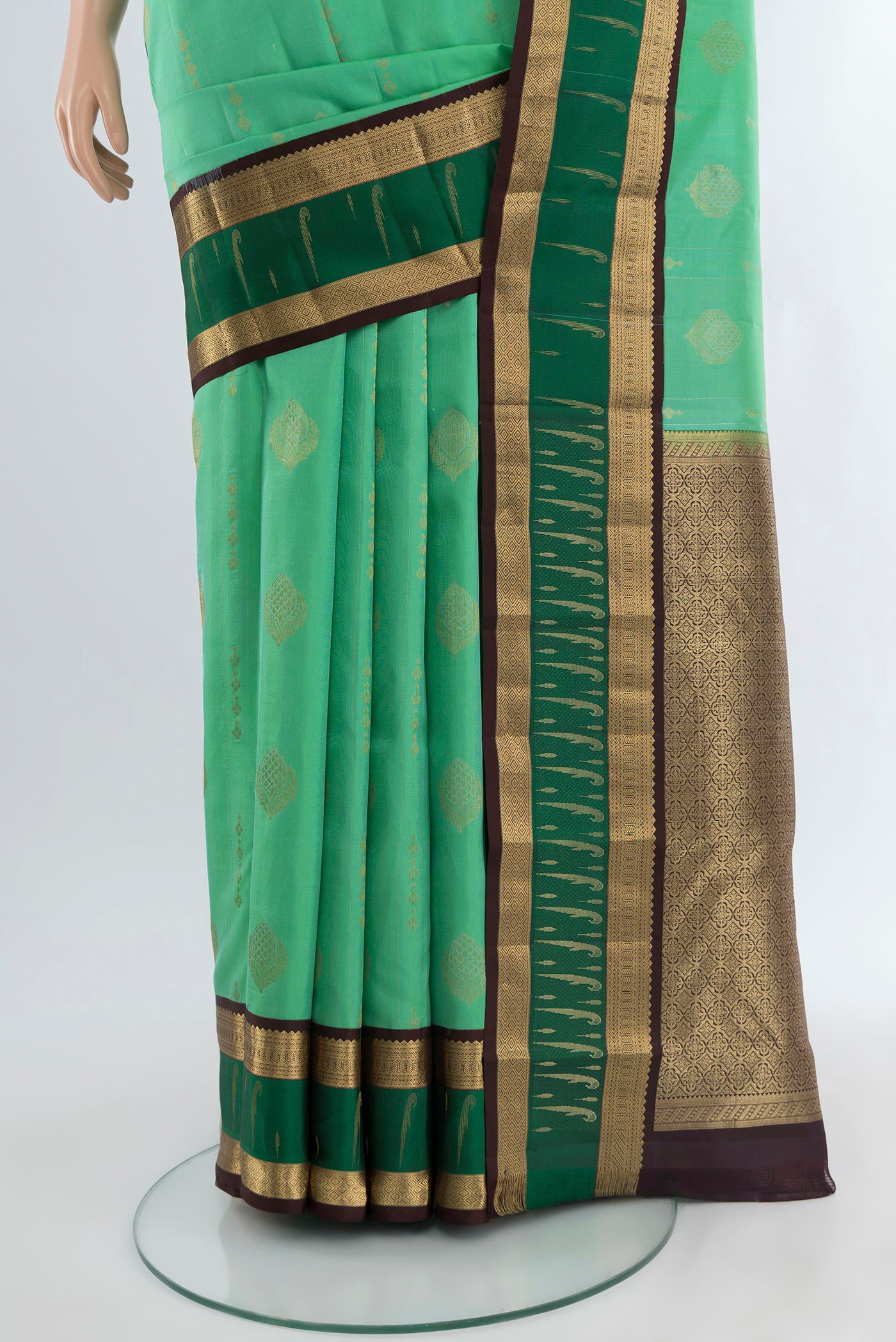 Pleats and pallu of Sea Green Kanjivaram Silk Saree with Zari Butta on the body and Zari Border. 
