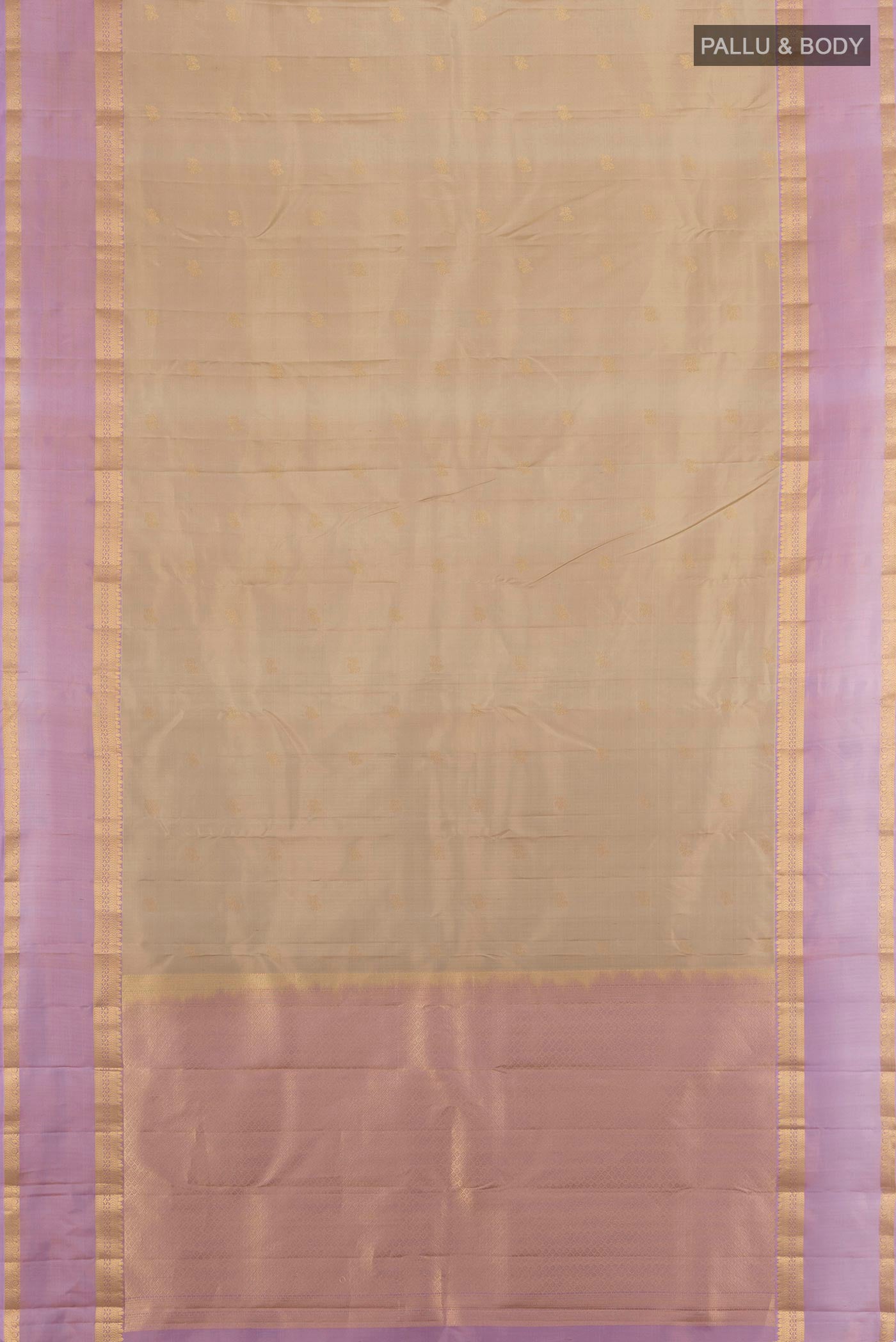 Flat view of Beige Kanchipuram Silk Saree with Zari Butta on the body and Zari Border. 