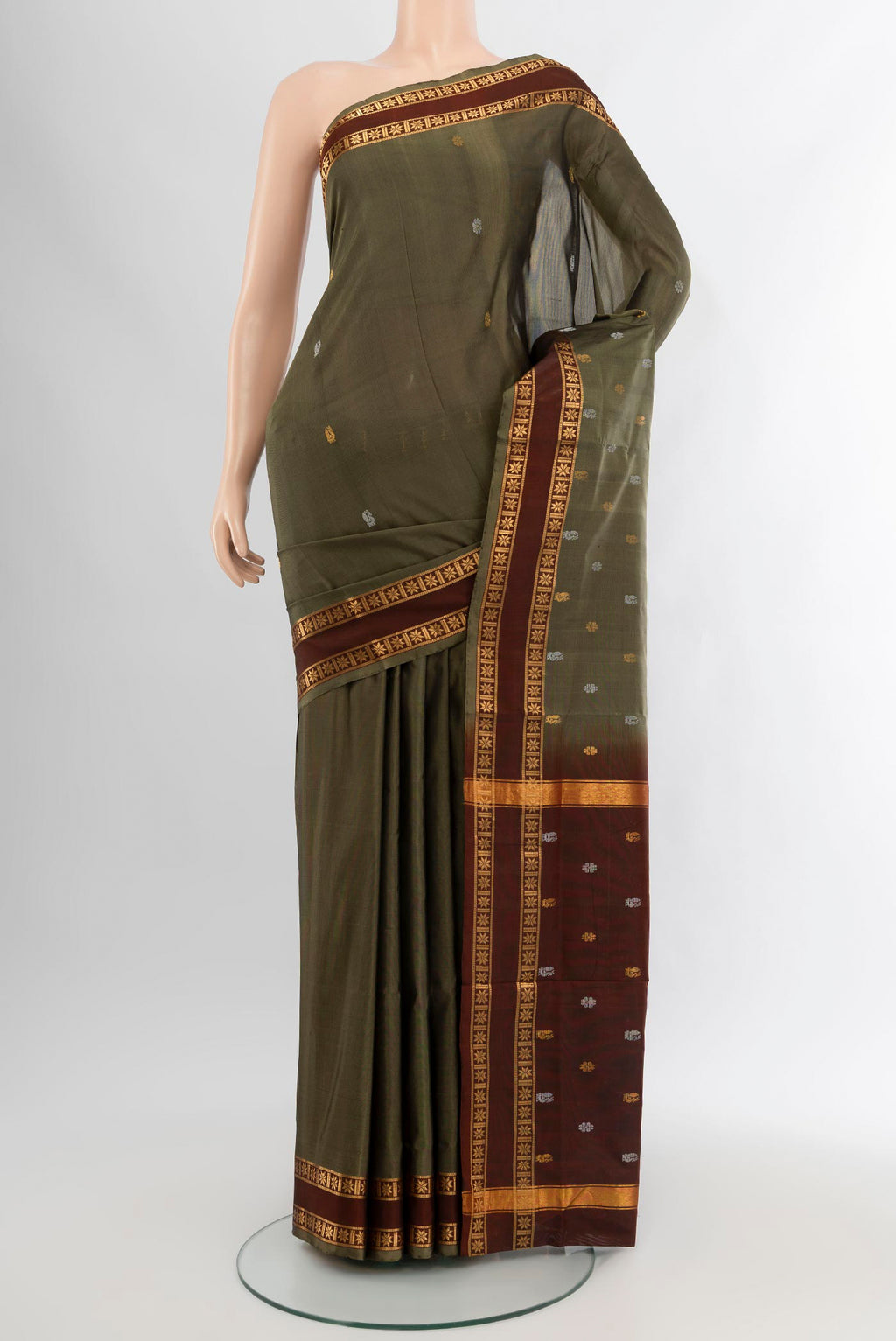 Mehandi Green Uppada Silk Saree with Zari Butta on the body and Zari Border.  displayed on a mannequin
