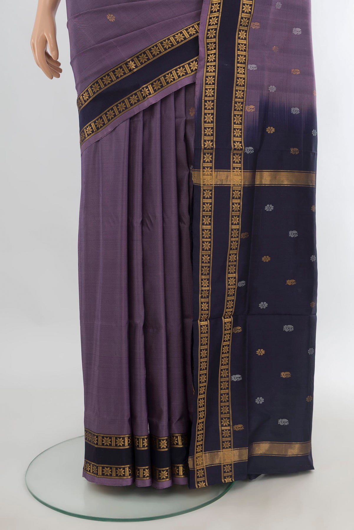 Pleats and pallu of Pure Silk Lavender Uppada Saree with Zari Butta on the body and Plain Border. 