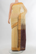 Cream Uppada Silk Saree with Zari Butta on the body and Silk Border.  displayed on a mannequin