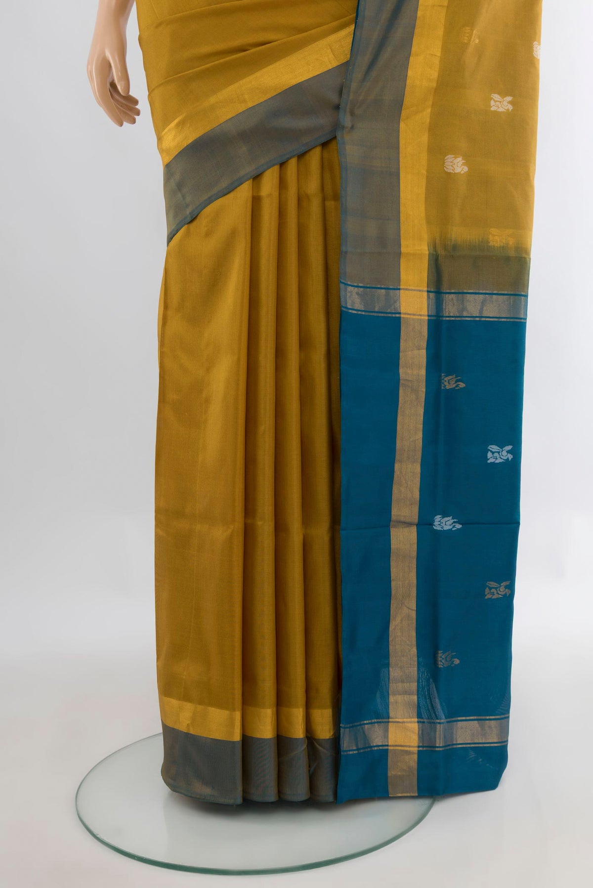 Pleats and pallu of Pure Silk Mustard Uppada Saree with Zari Butta on the body and Zari Border. 