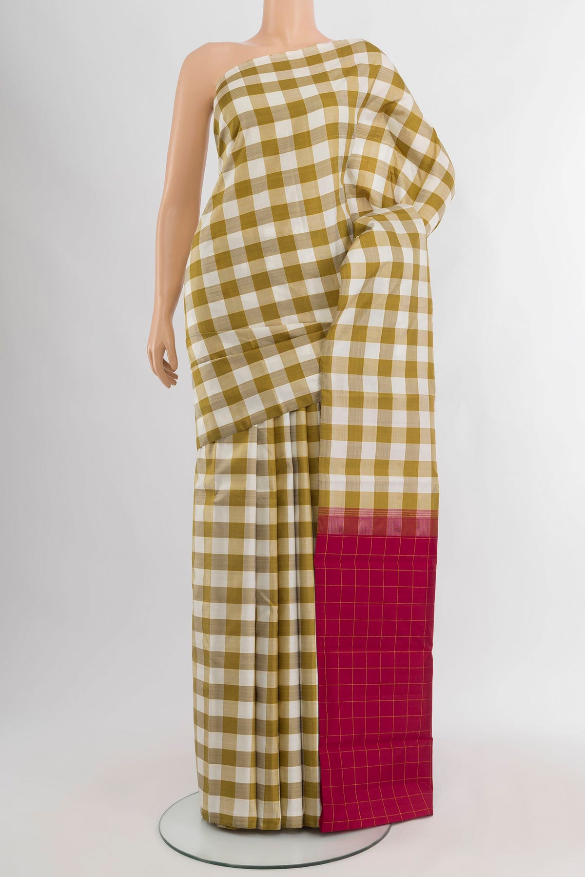 Multi Color Kanchipuram Silk Saree with Checked design on the body and Without Border.  displayed on a mannequin