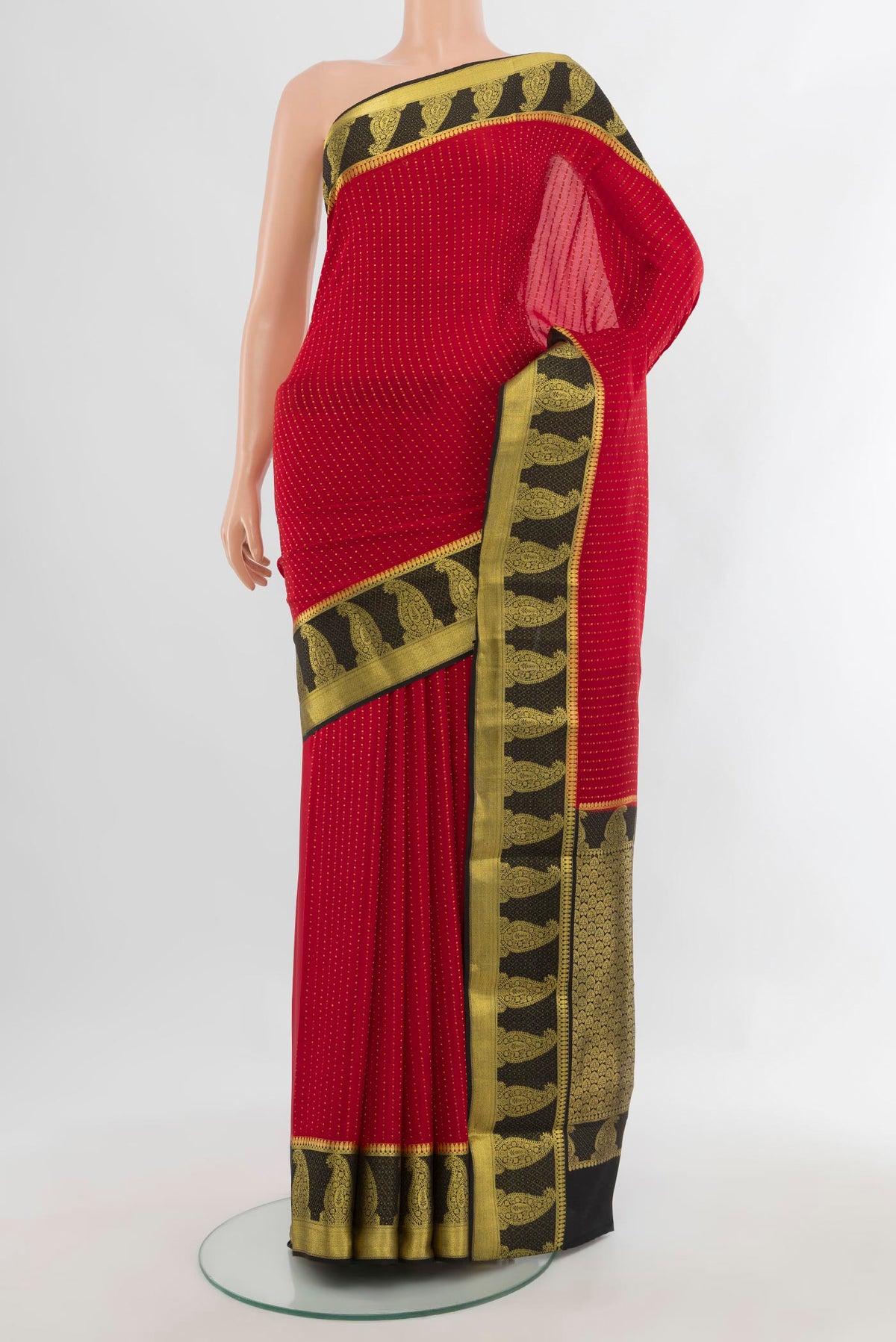Red Mysore Crepe Saree with Zari Butta on the body and Zari Border.  displayed on a mannequin