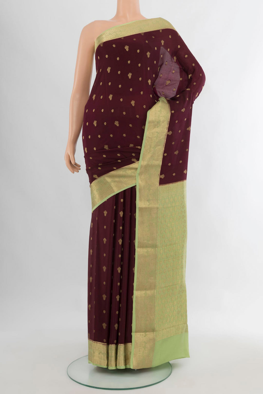 Coffee Brown Mysore Crepe Saree with Plain Body and Zari Border.  displayed on a mannequin