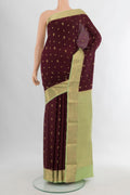 Coffee Brown Mysore Crepe Saree with Plain Body and Zari Border.  displayed on a mannequin