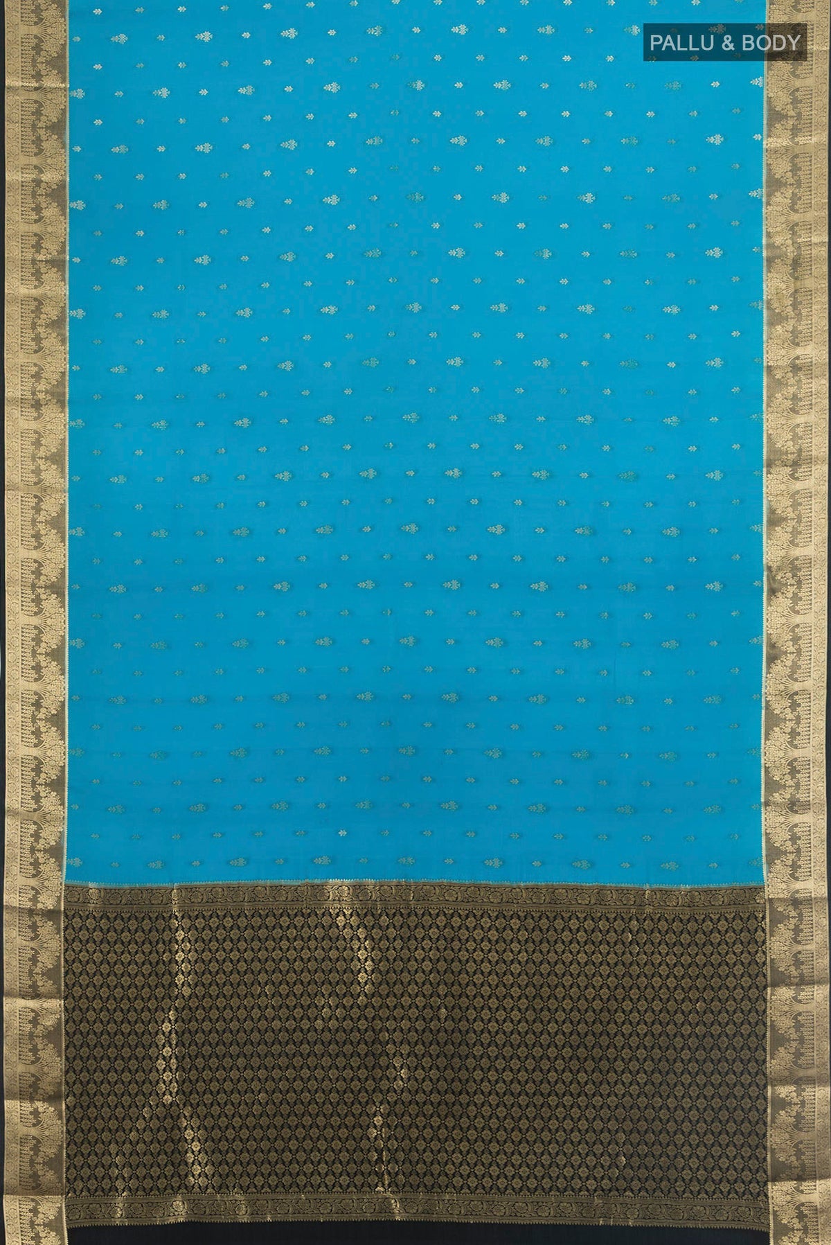 Flat view of Light Blue Mysore Crepe Saree with Zari Butta on the body and Zari Border. 