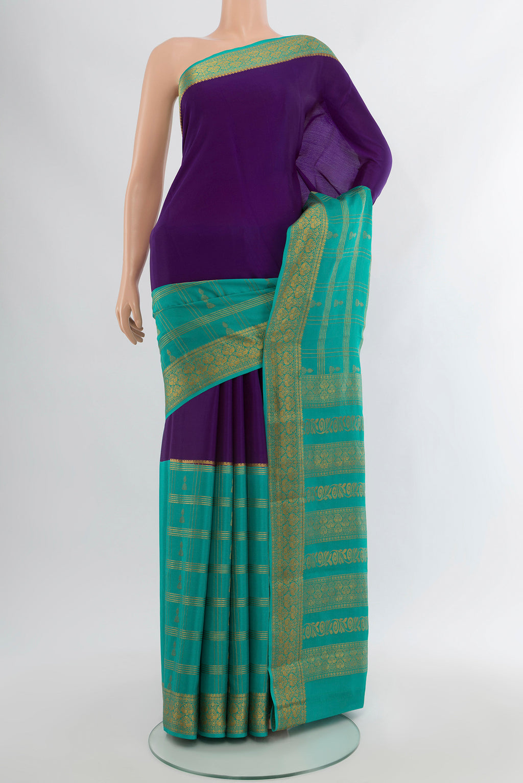 Violet Mysore Crepe Saree with Zari Butta on the body and Silk Border.  displayed on a mannequin