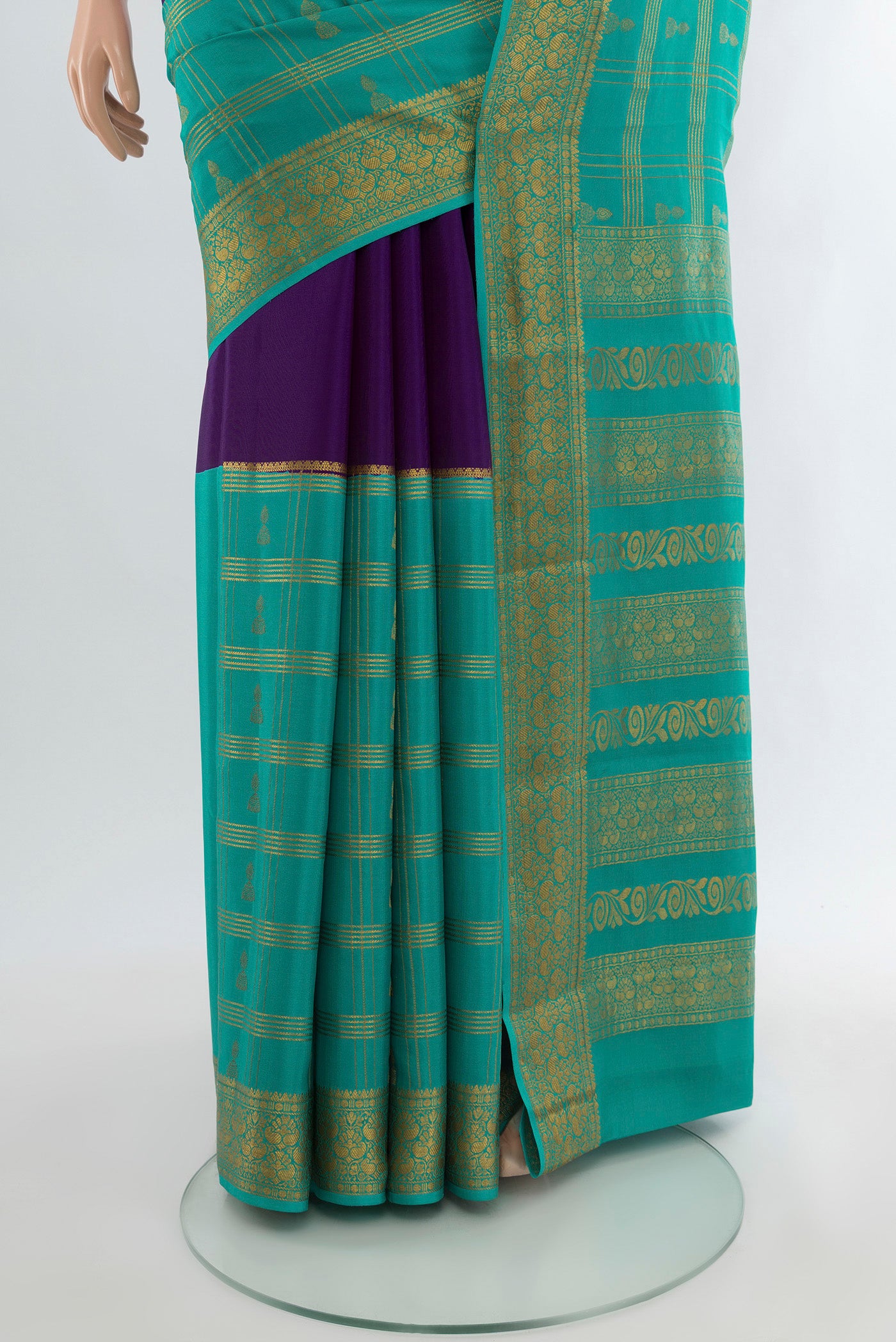 Pleats and pallu of Violet Mysore Crepe Saree with Zari Butta on the body and Silk Border. 