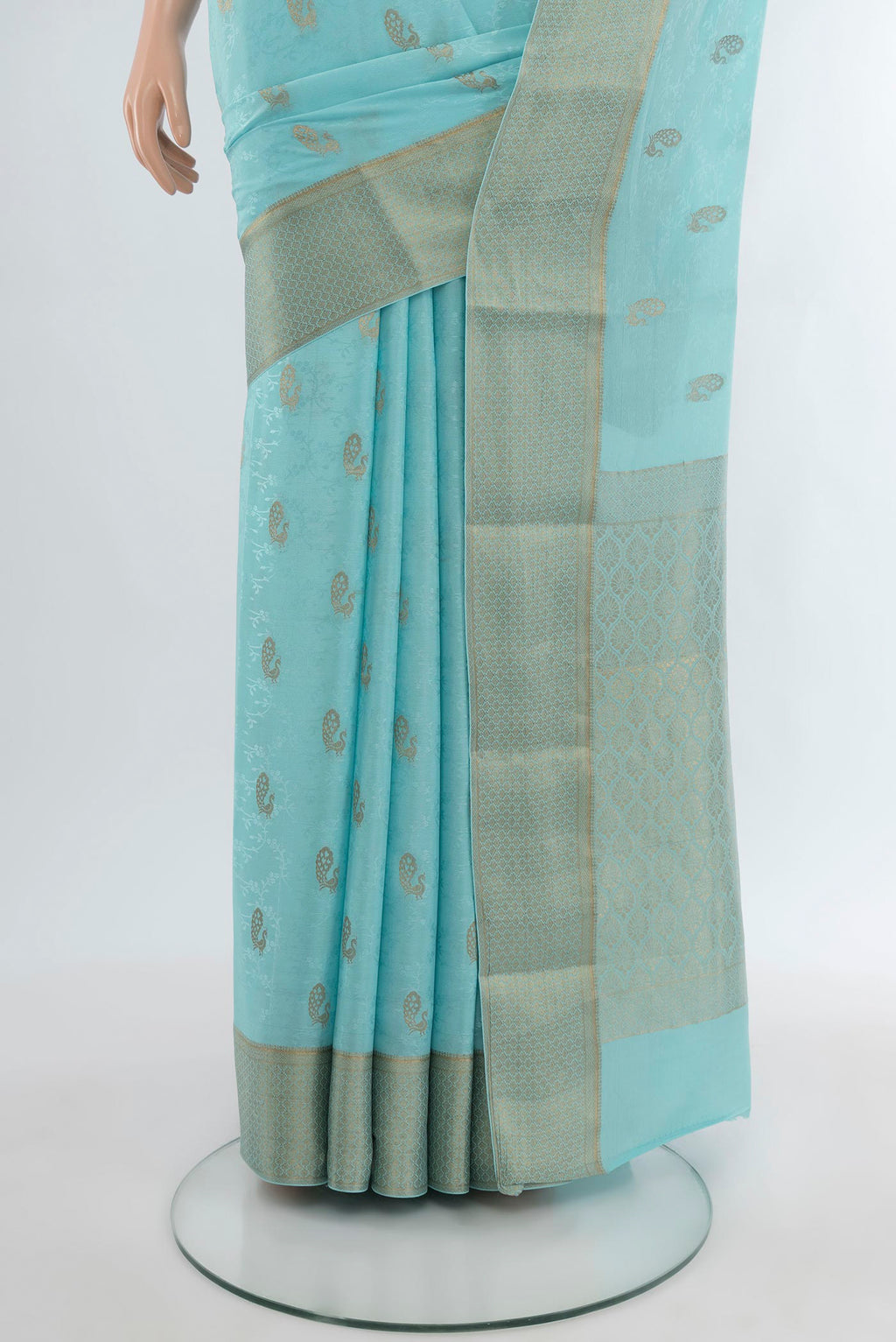 Pleats and pallu of Sky Blue Mysore Crepe Saree with Zari Butta on the body and Zari Border. 