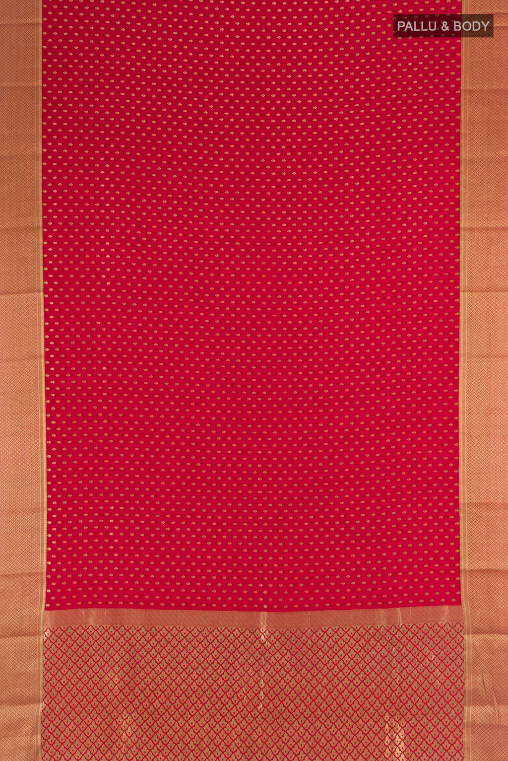Flat view of Red Mysore Crepe Saree with Zari Butta on the body and Zari Border. 