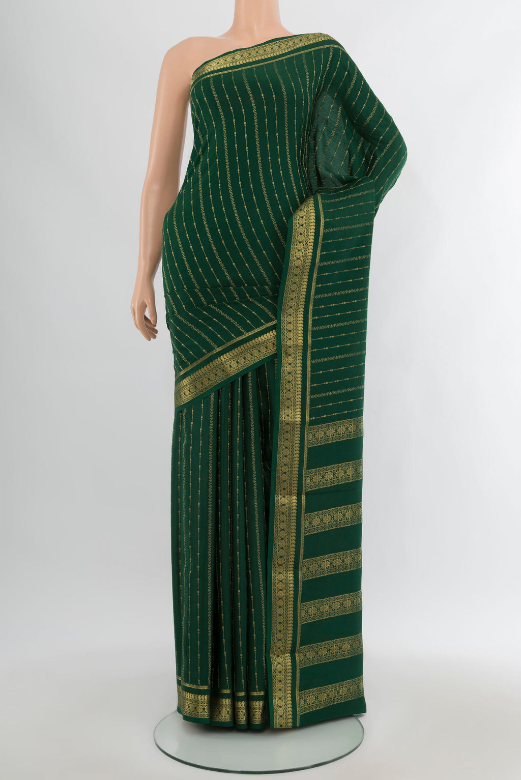 Bottle Green Mysore Crepe Saree with Stripes on the body and Zari Border.  displayed on a mannequin
