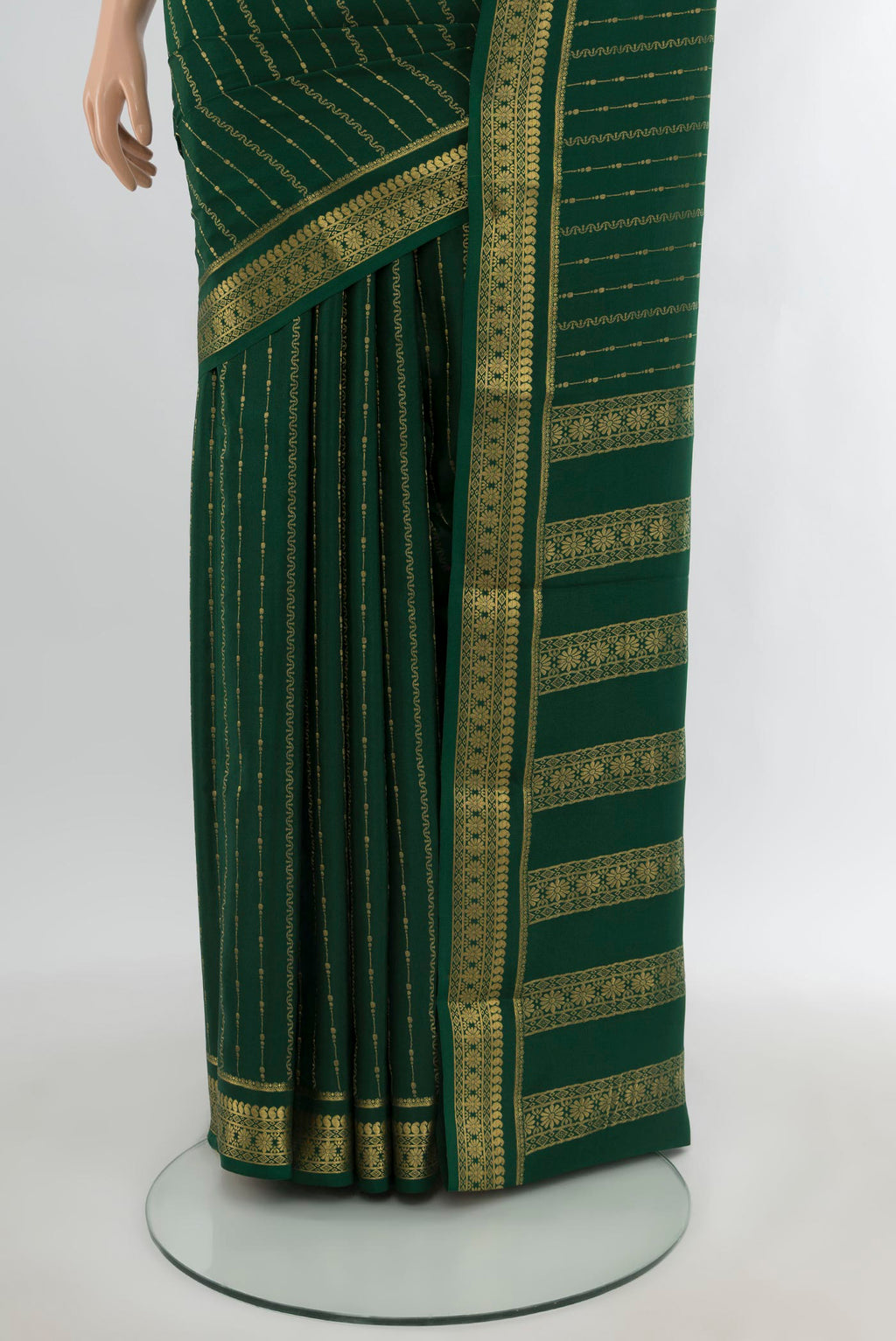 Pleats and pallu of Bottle Green Mysore Crepe Saree with Stripes on the body and Zari Border. 