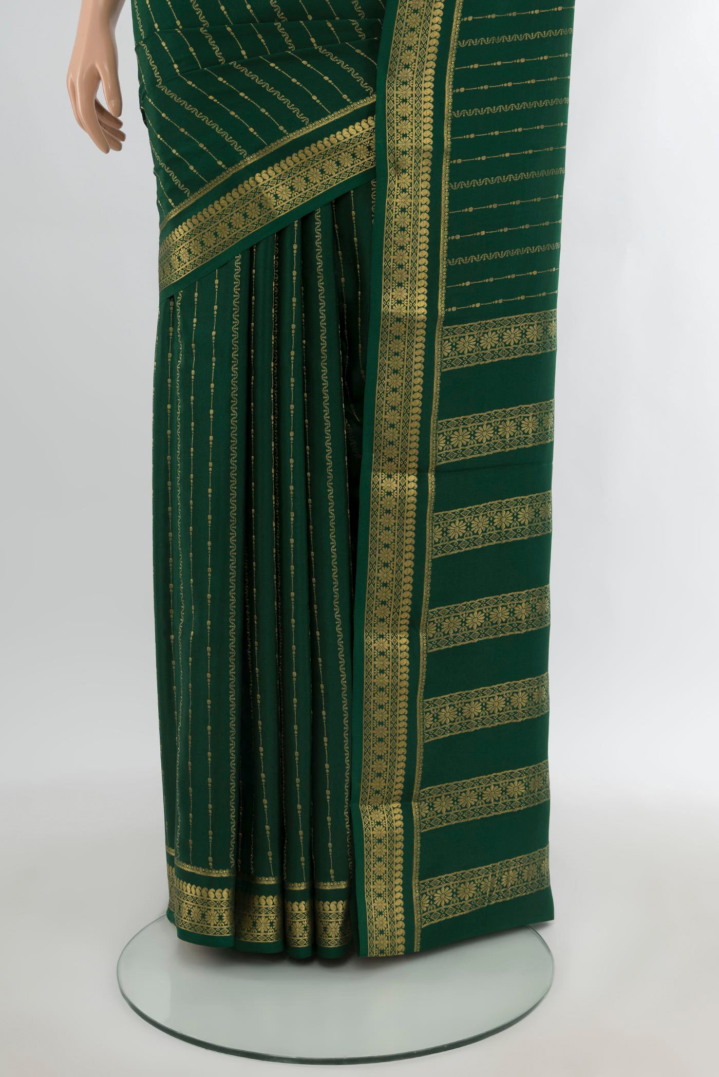 Pleats and pallu of Bottle Green Mysore Crepe Saree with Stripes on the body and Zari Border. 