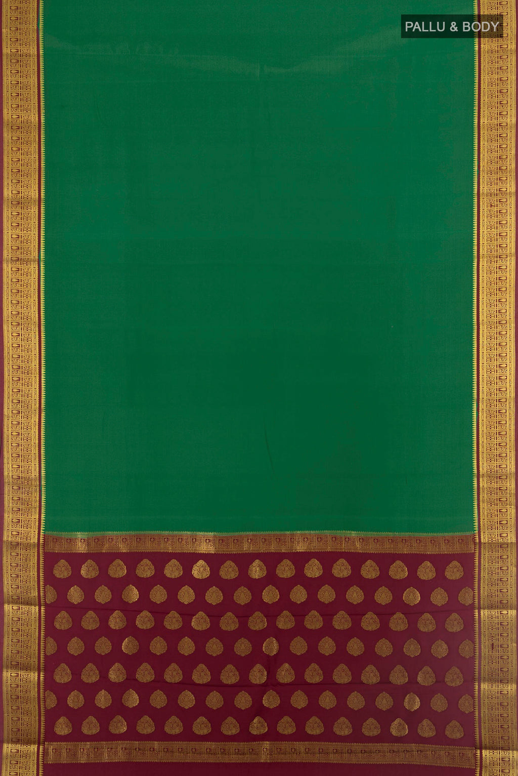Flat view of Green Mysore Crepe Saree with Plain Body and Zari Border. 