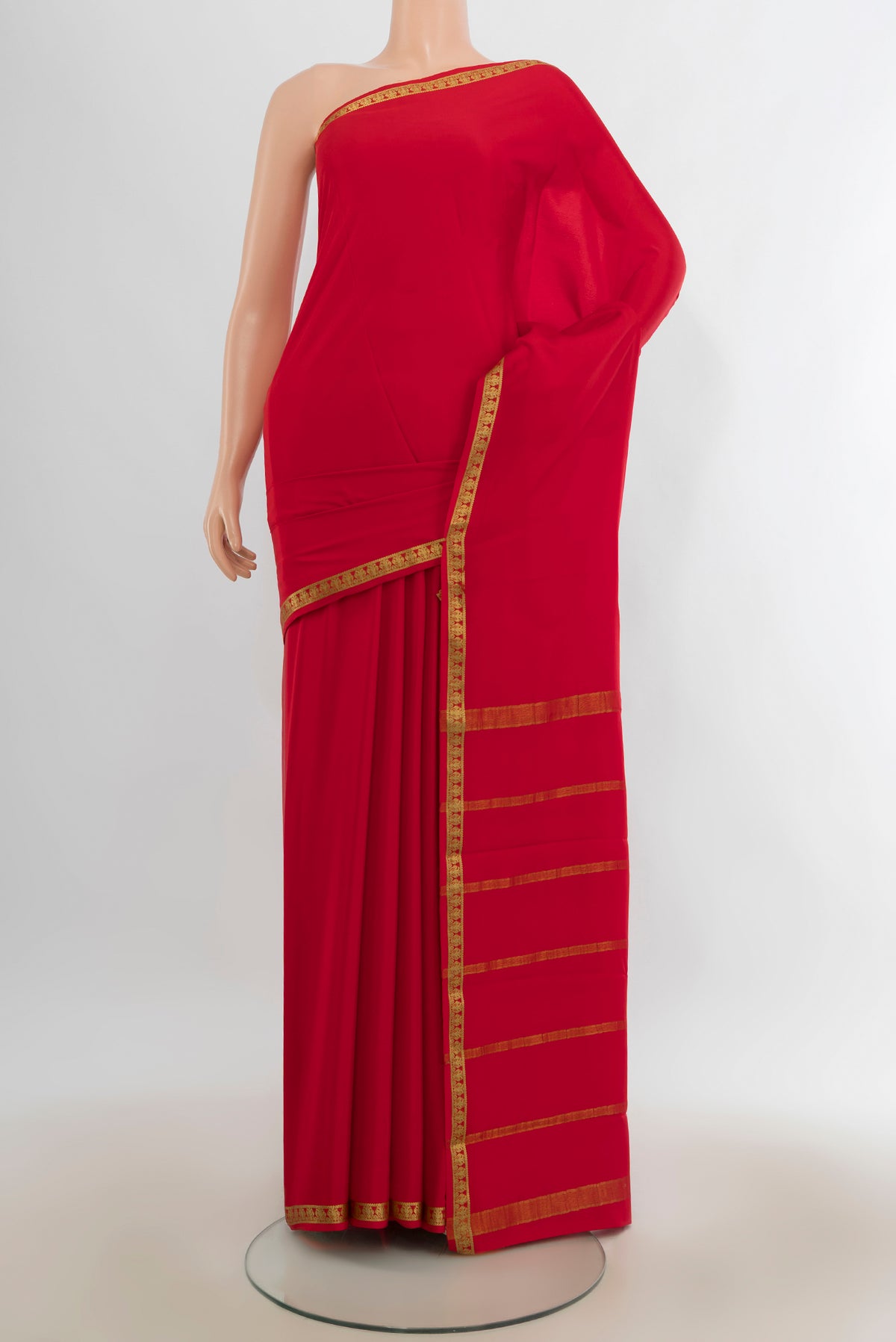 Red Mysore Crepe Saree with Plain Body and Zari Border.  displayed on a mannequin