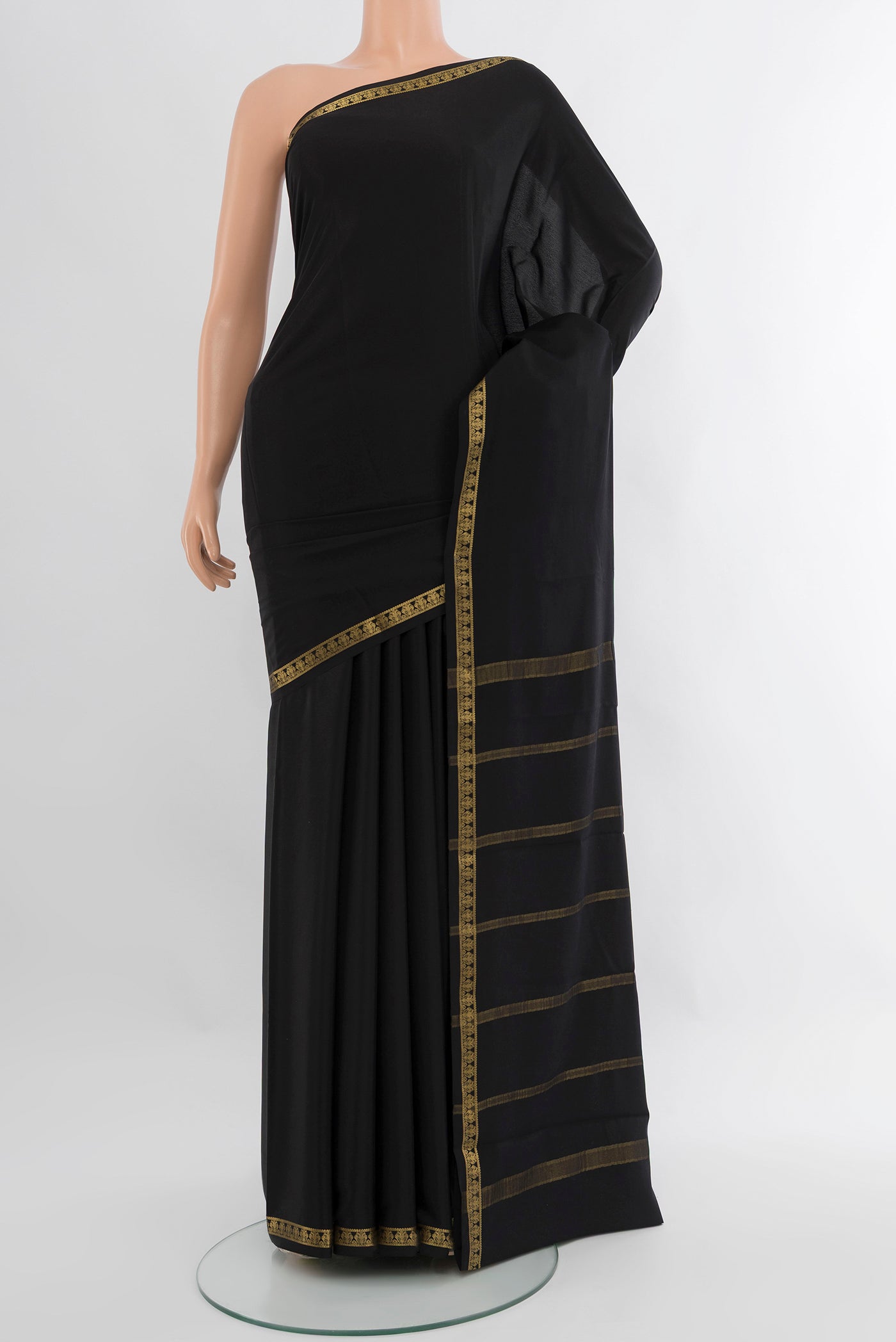 Black Mysore Crepe Saree with Plain Body and Zari Border.  displayed on a mannequin