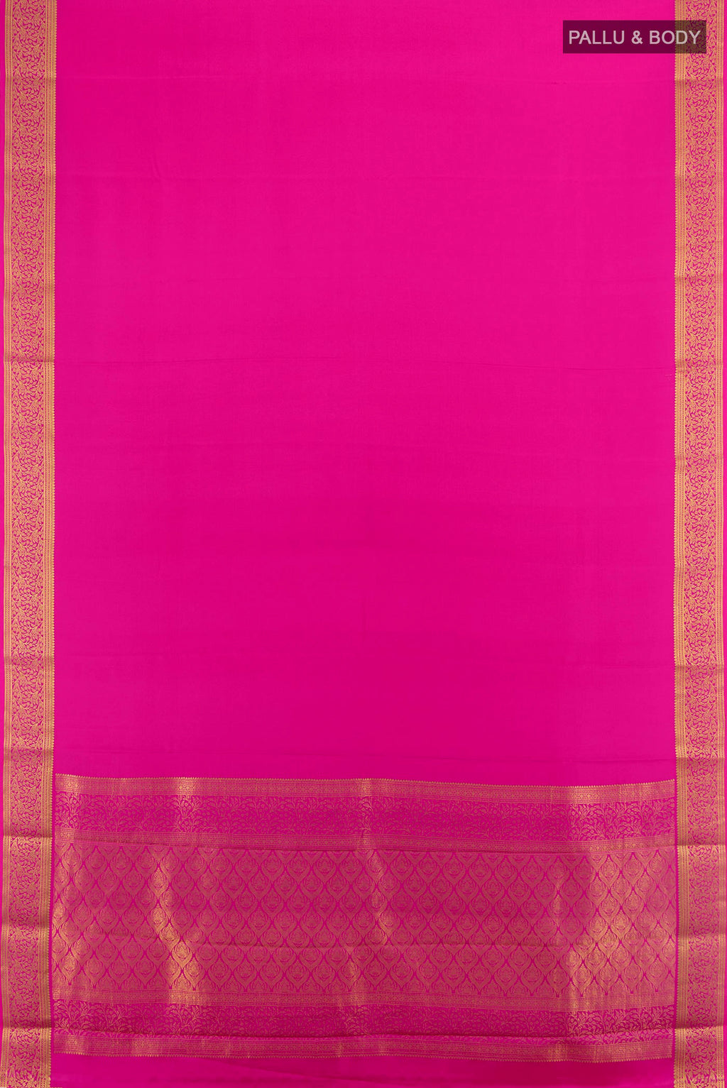 Flat view of Rani Pink Mysore Crepe Saree with Plain Body and Zari Border. 