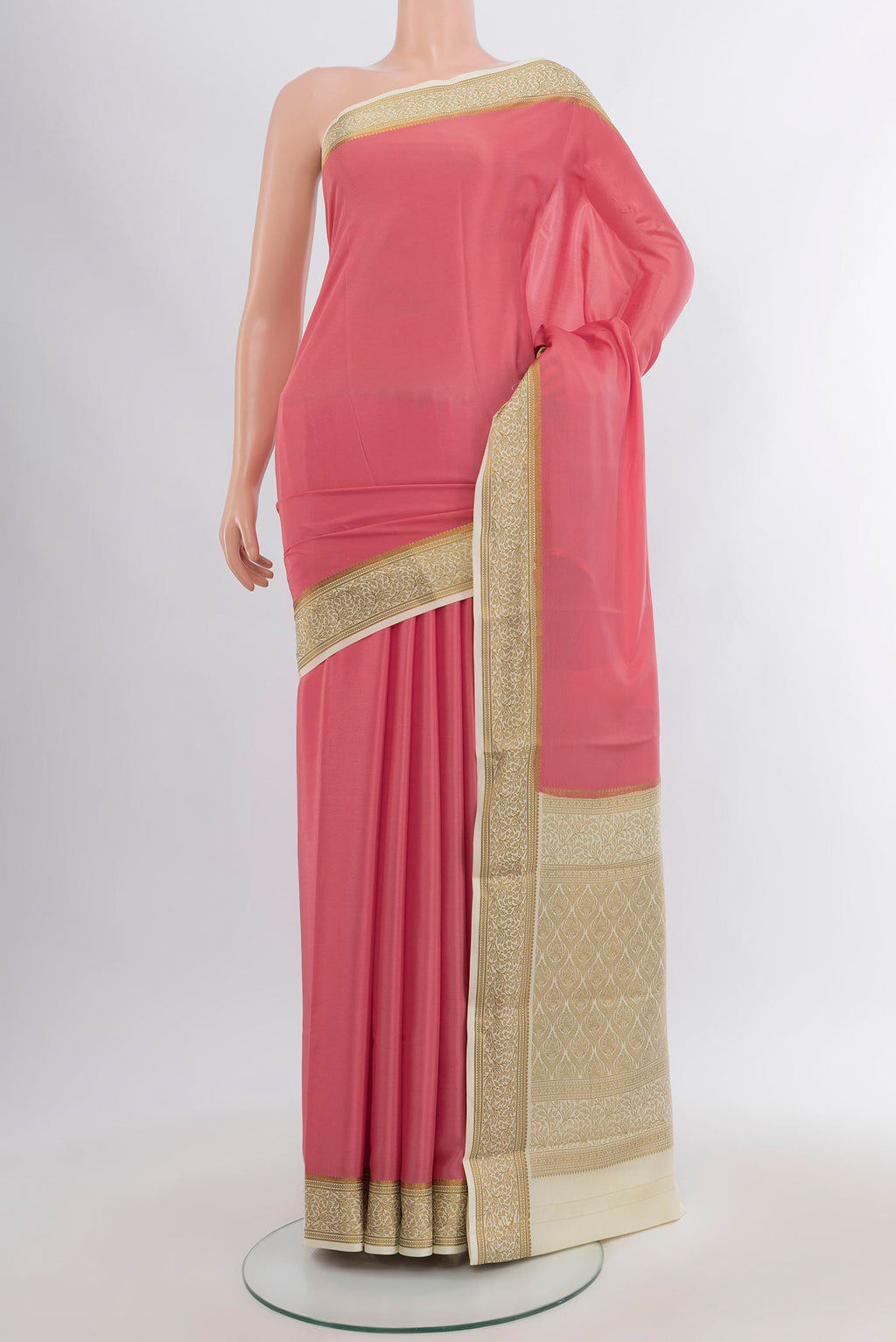 Rose pink Mysore Crepe Saree with Plain Body and Zari Border.  displayed on a mannequin