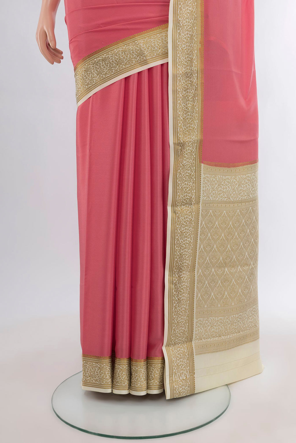 Pleats and pallu of Rose pink Mysore Crepe Saree with Plain Body and Zari Border. 