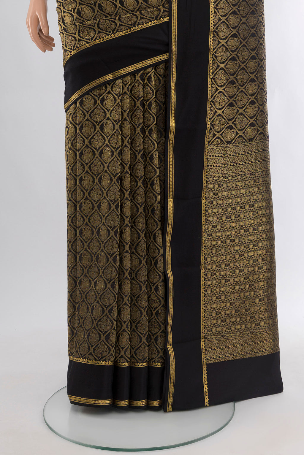 Pleats and pallu of Black Mysore Crepe Saree with Zari Brocade on the body and Zari Border. 