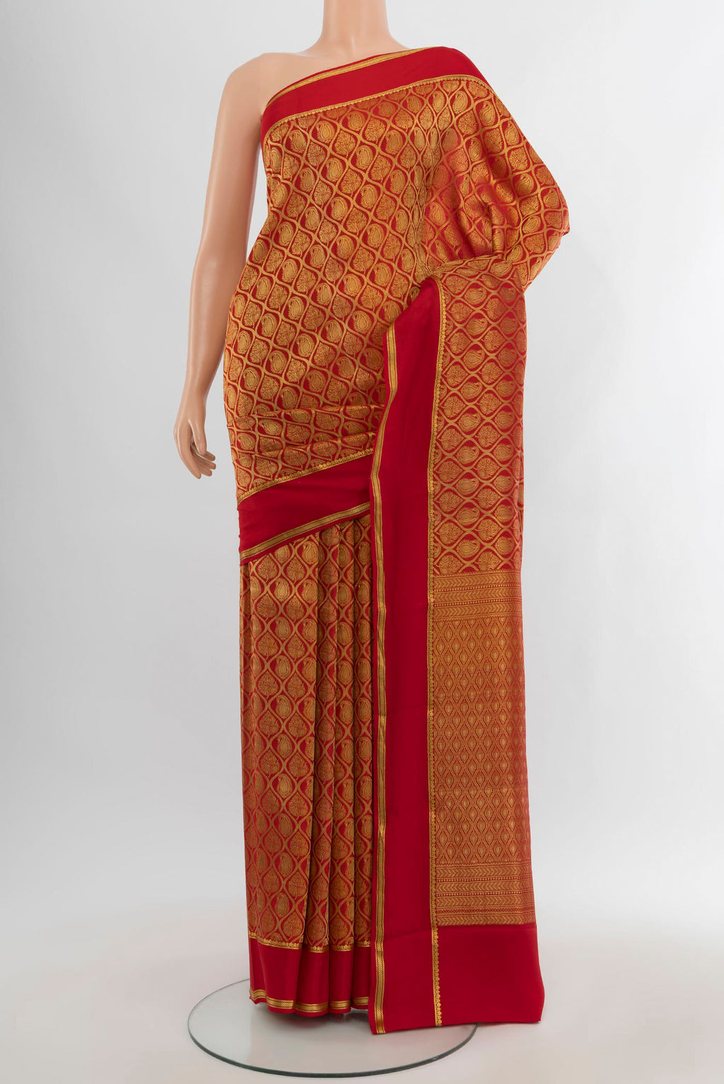 Red Mysore Crepe Saree with Zari Brocade on the body and Plain Border.  displayed on a mannequin