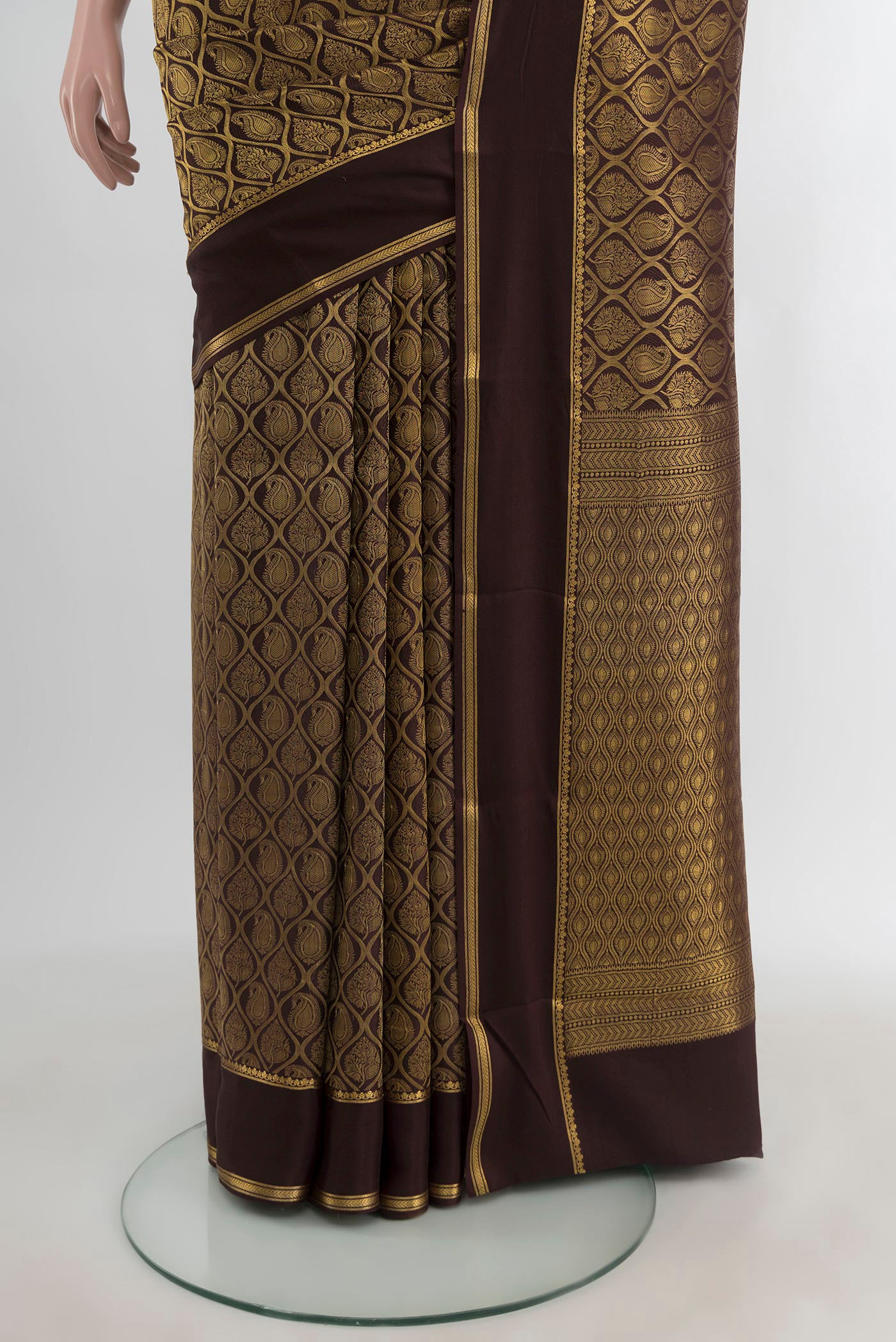 Pleats and pallu of Coffee Brown Mysore Crepe Saree with Zari Brocade on the body and Plain Border. 