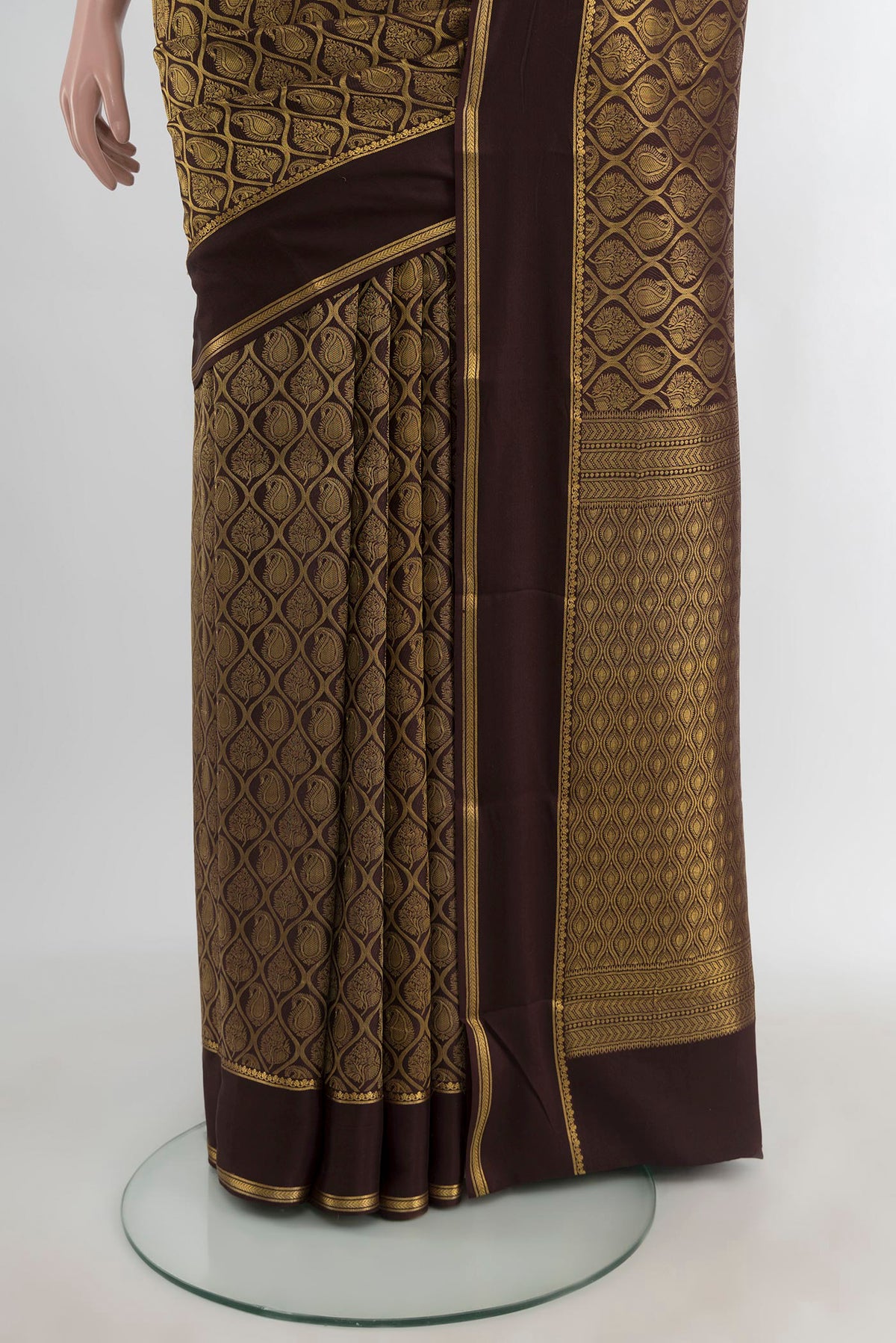 Pleats and pallu of Coffee Brown Mysore Crepe Saree with Zari Brocade on the body and Plain Border. 
