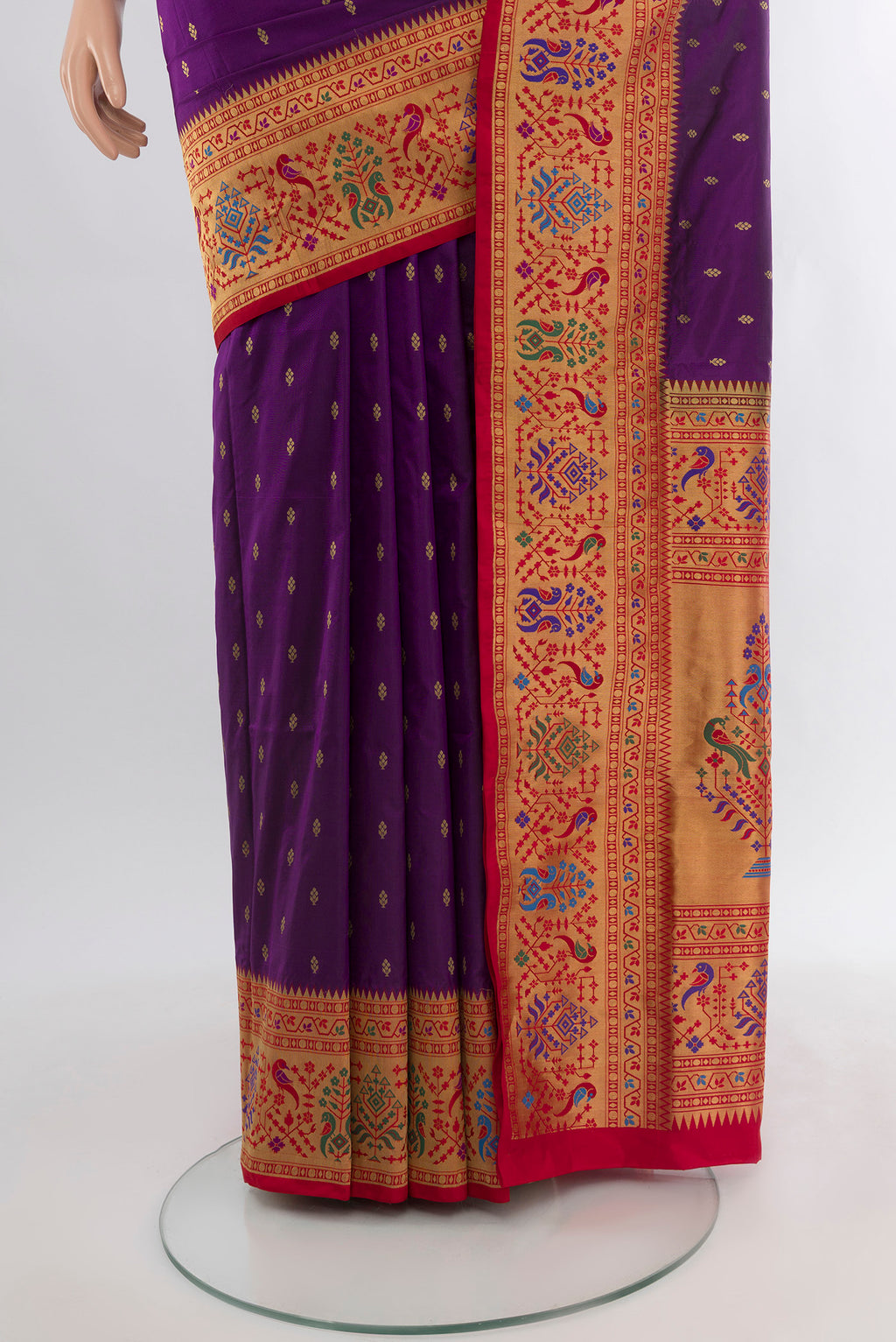 Pleats and pallu of Violet Soft Silk Saree with Zari Butta on the body and Paithani Border. 