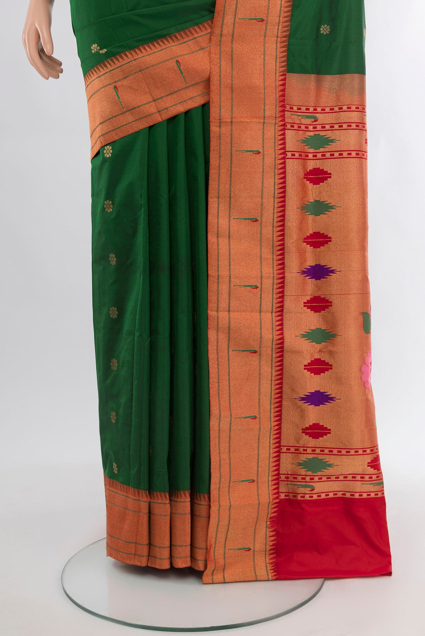 Pleats and pallu of Bottle Green Paithani Silk Saree with Zari Butta on the body and Paithani Border. 
