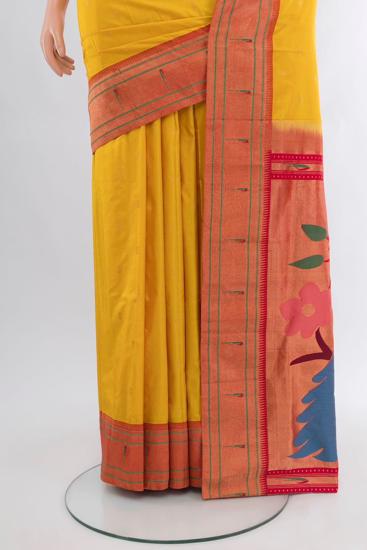 Pleats and pallu of Mustard Paithani Silk Saree with Zari Butta on the body and Paithani Border. 
