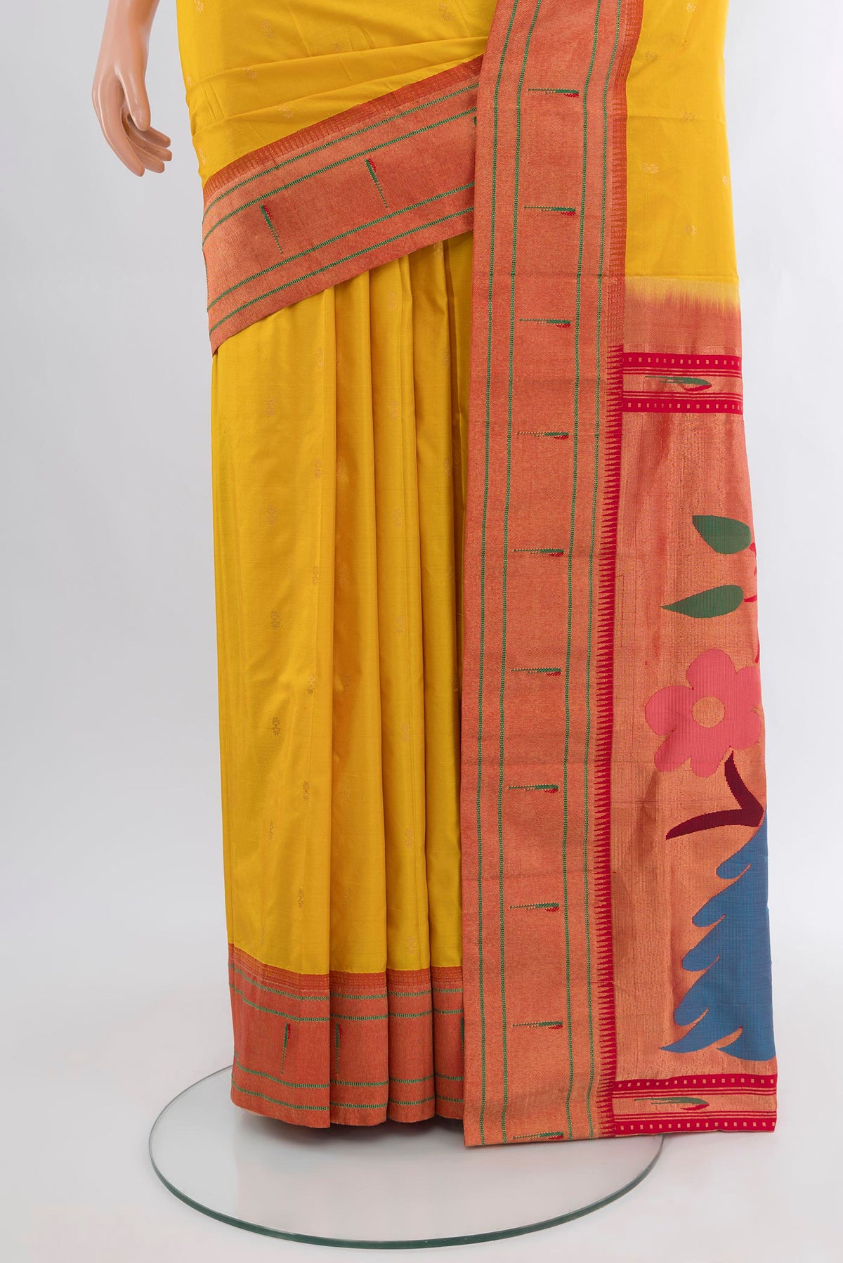 Pleats and pallu of Mustard Paithani Silk Saree with Zari Butta on the body and Paithani Border. 