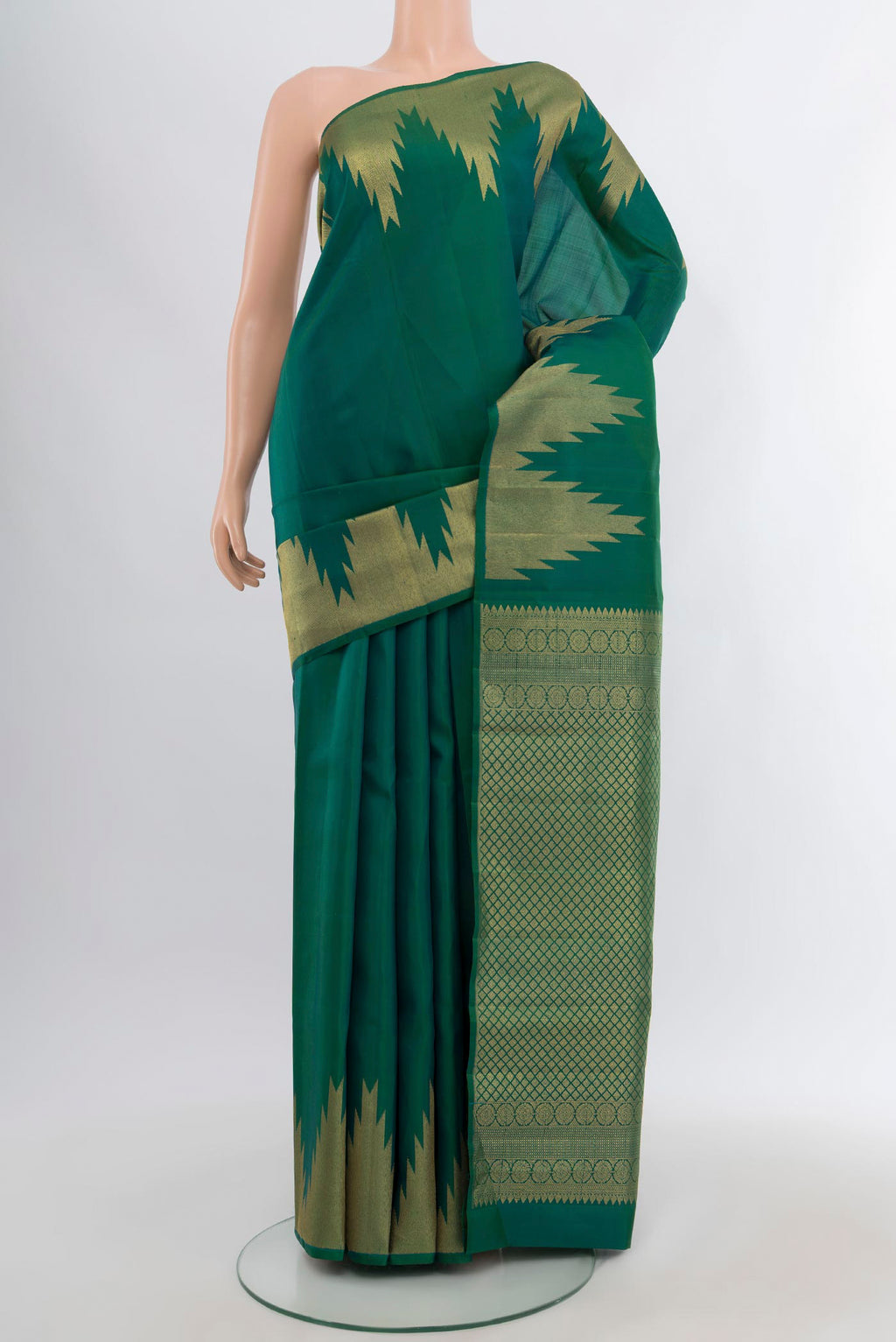 Green Kanjivaram Silk Saree with Plain Body and Temple Border.  displayed on a mannequin