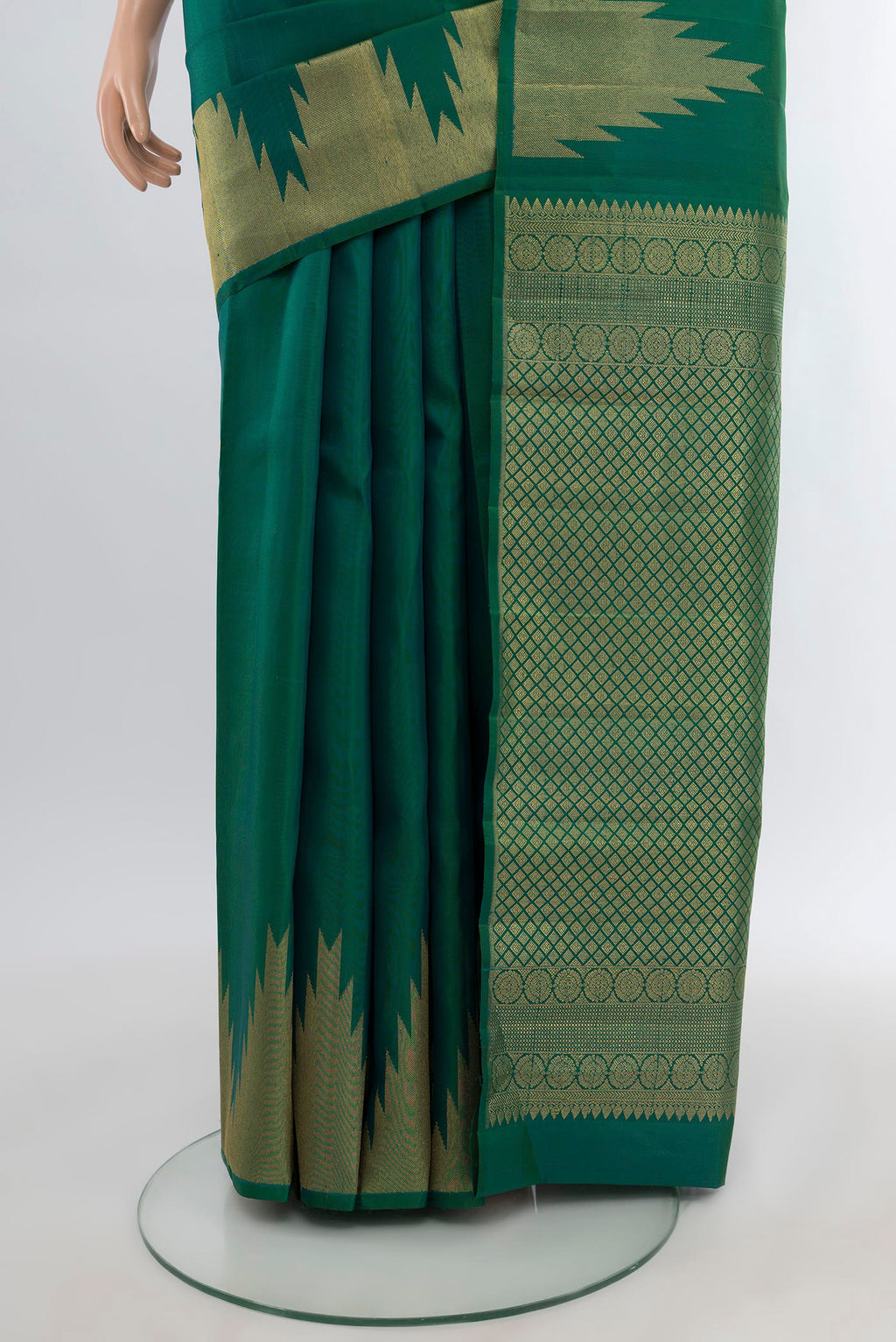 Pleats and pallu of Green Kanjivaram Silk Saree with Plain Body and Temple Border. 
