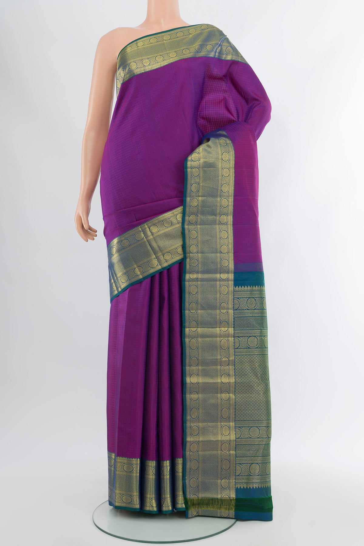 Purple Kanjivaram Silk Saree with Checked design on the body and Zari Border.  displayed on a mannequin