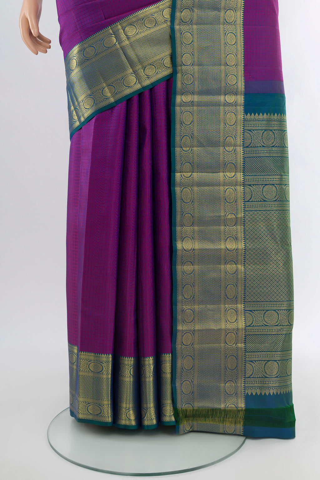 Pleats and pallu of Purple Kanjivaram Silk Saree with Checked design on the body and Zari Border. 