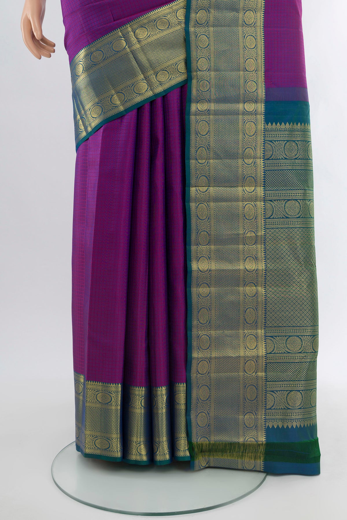 Pleats and pallu of Purple Kanjivaram Silk Saree with Checked design on the body and Zari Border. 