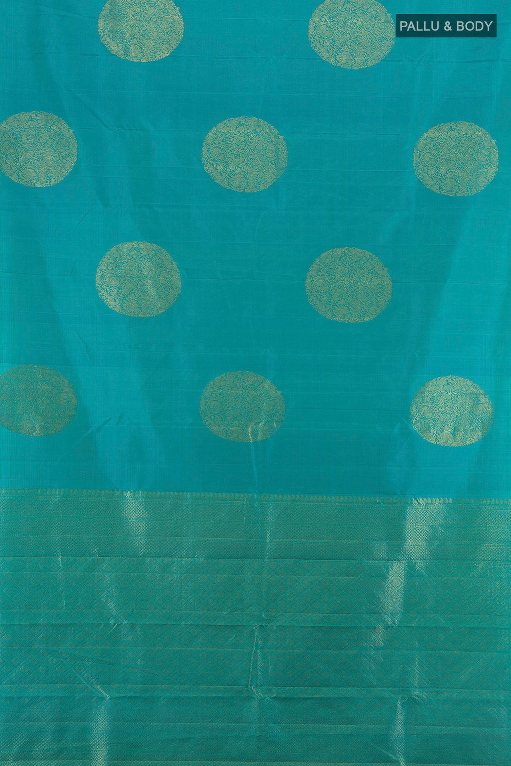 Flat view of Light Blue Kanchipuram Silk Saree with Zari Butta on the body and Without Border. 
