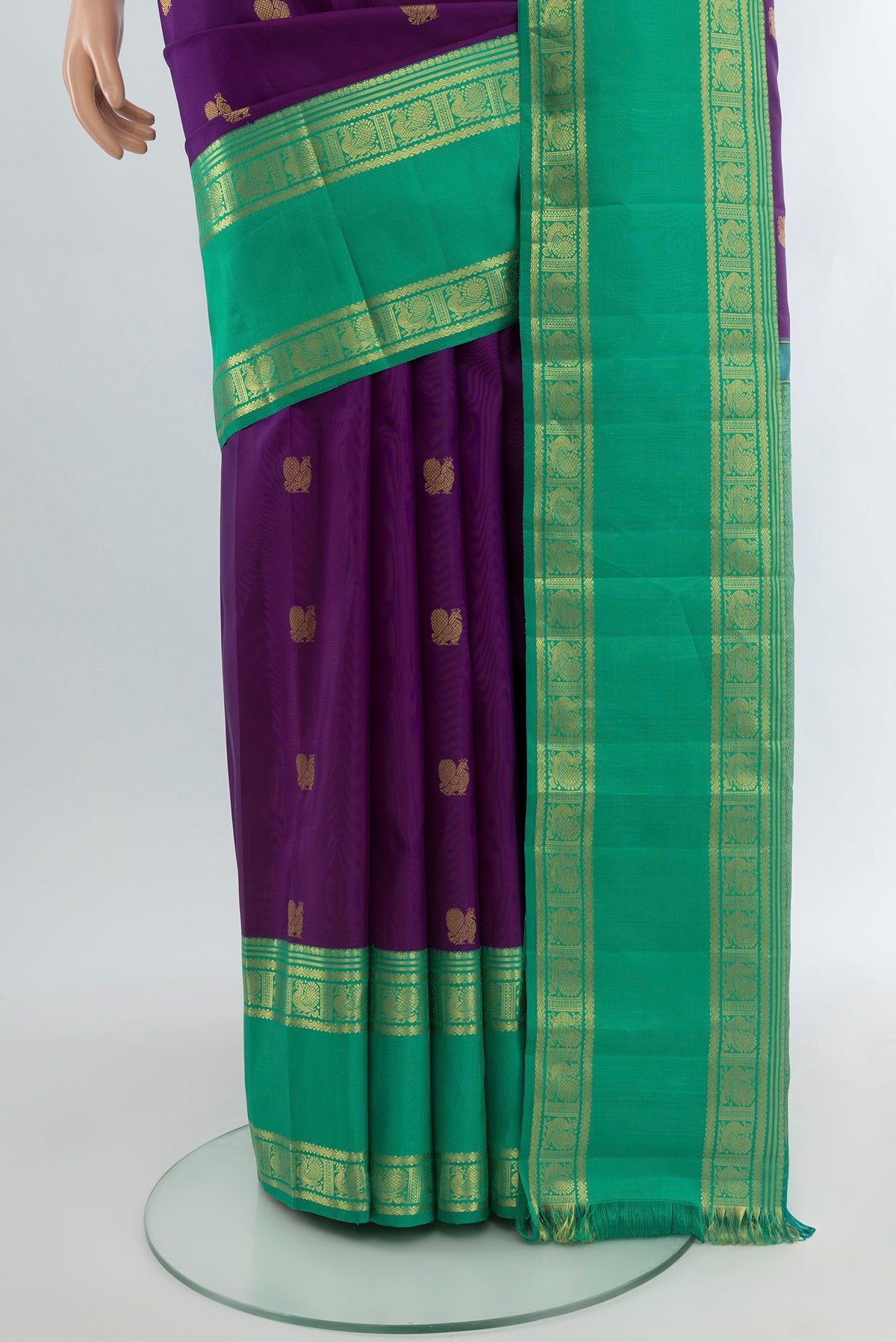 Pleats and pallu of Violet Kanjivaram Silk Saree with Zari Butta on the body and Zari Border. 