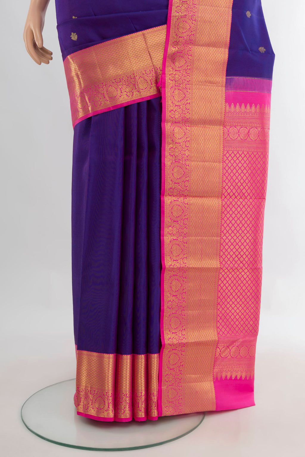 Pleats and pallu of Pure Silk Violet Kanjivaram Saree with Zari Butta on the body and Zari Border. 