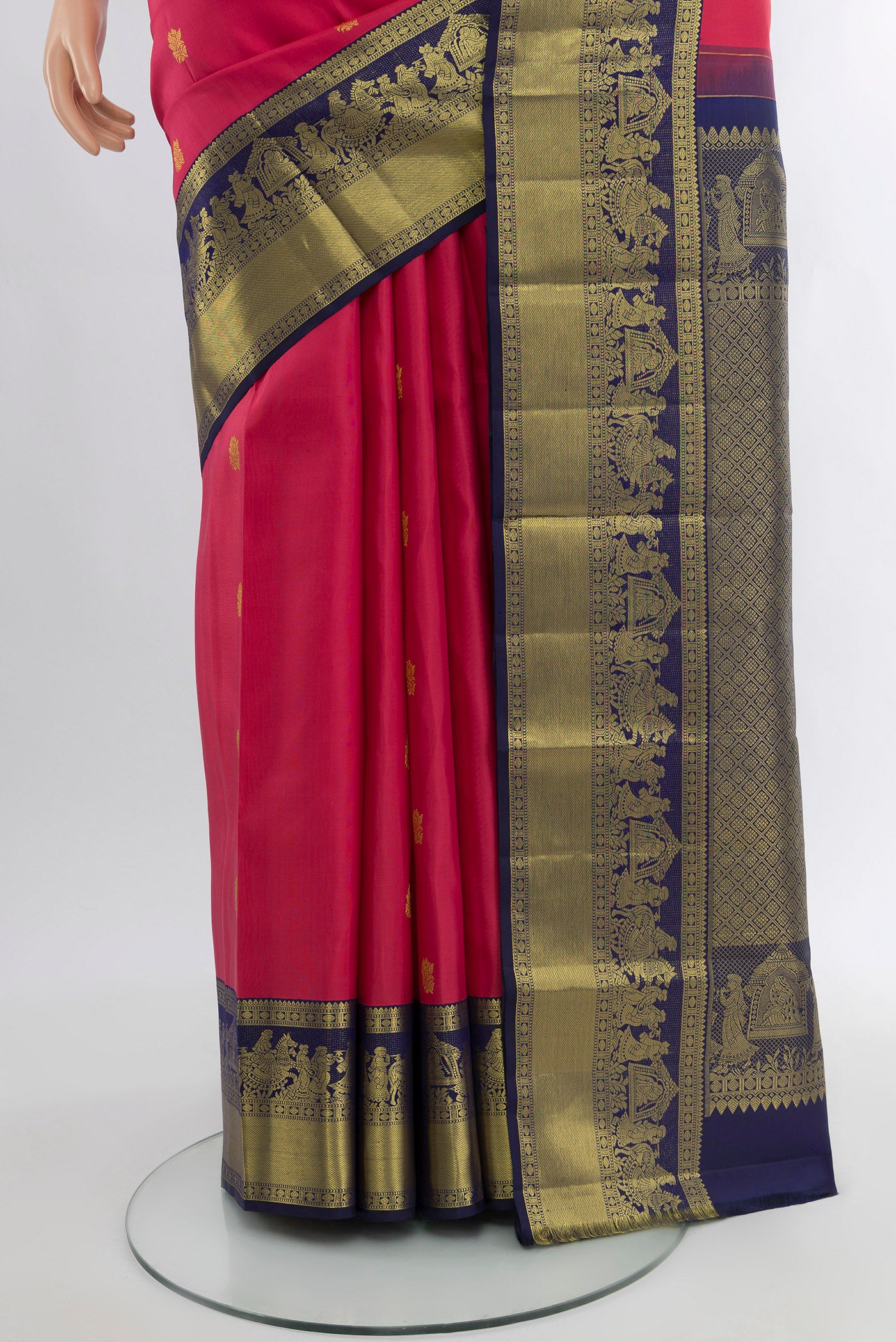 Pleats and pallu of Pink Kanjivaram Silk Saree with Zari Butta on the body and Zari Border. 
