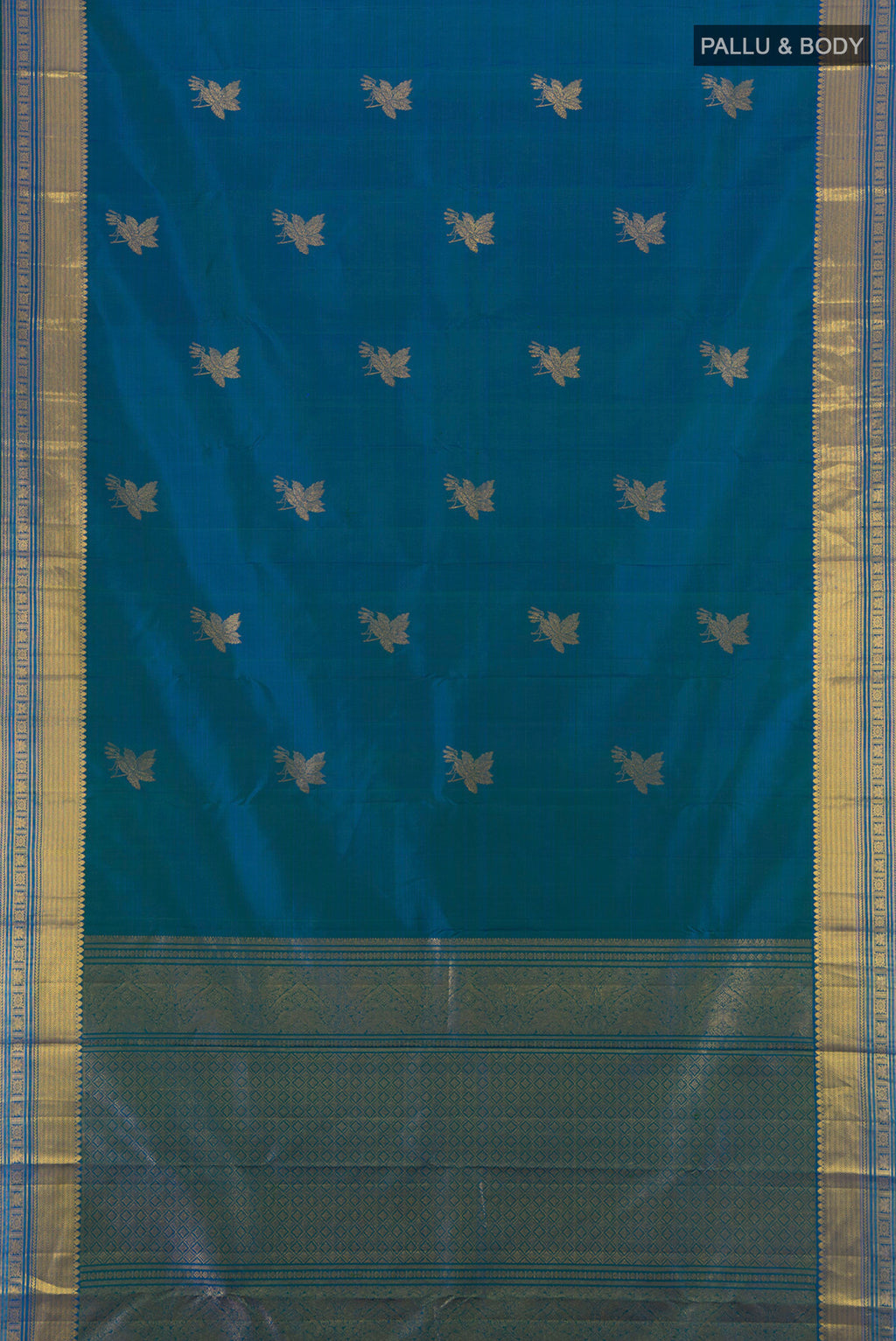 Flat view of Peacock Blue Kanchipuram Silk Saree with Zari Butta on the body and Zari Border. 