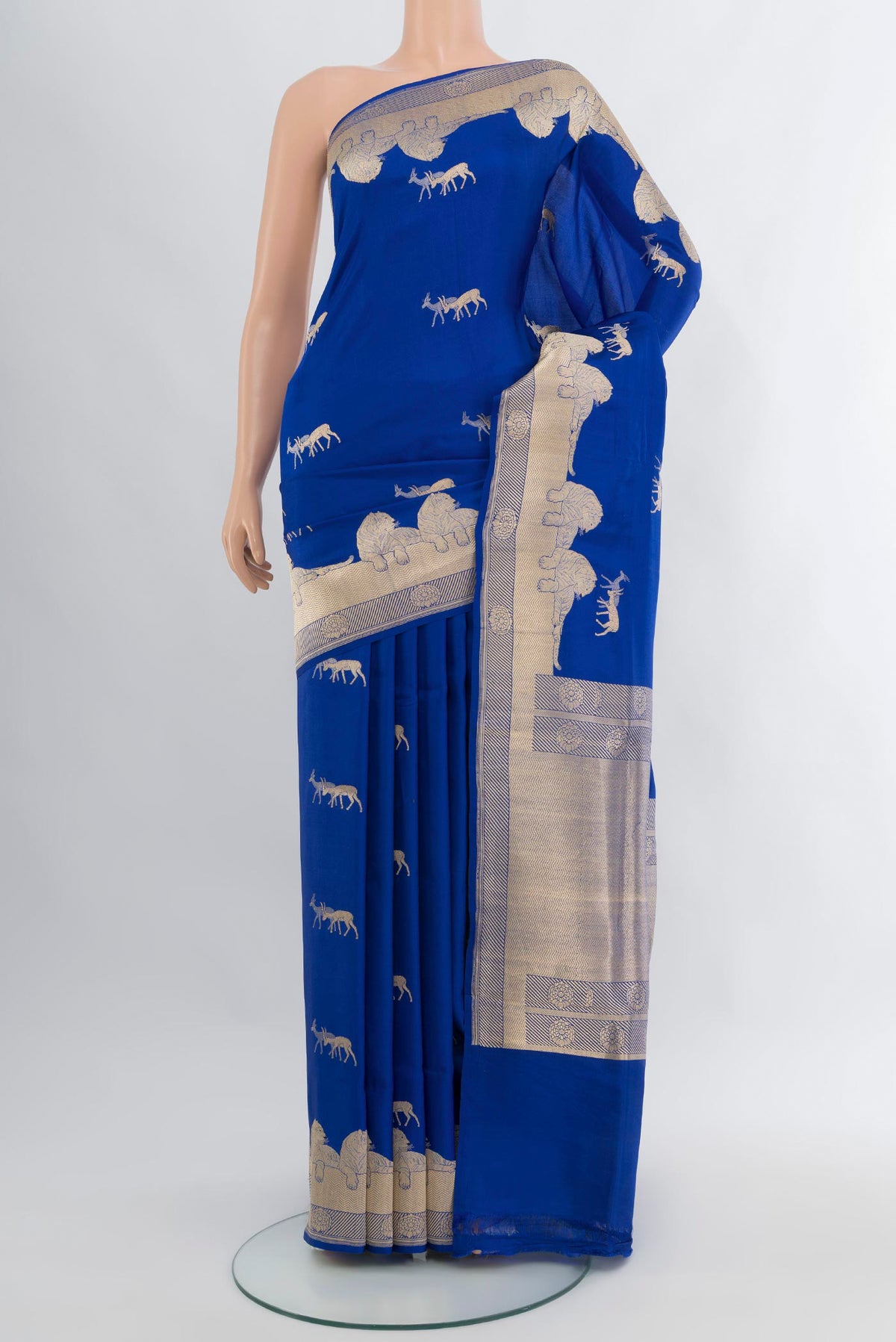 Royal Blue Banarasi Silk Saree with Zari Butta on the body and Zari Border.  displayed on a mannequin