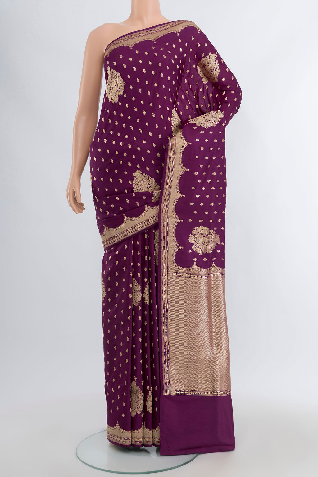 Violet Banarasi Katan Silk Saree with Zari Butta on the body and Silk Border.  displayed on a mannequin