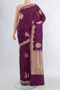 Violet Banarasi Katan Silk Saree with Zari Butta on the body and Silk Border.  displayed on a mannequin