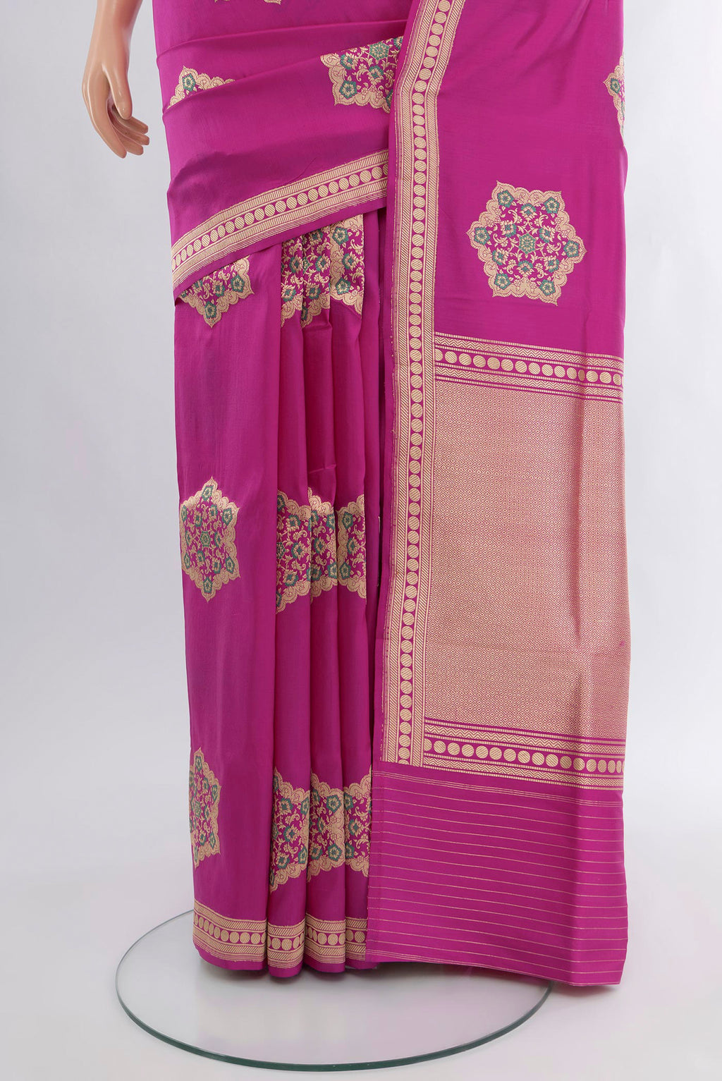 Pleats and pallu of Magenta Banarasi Silk Saree with Zari Butta on the body and Zari Border. 