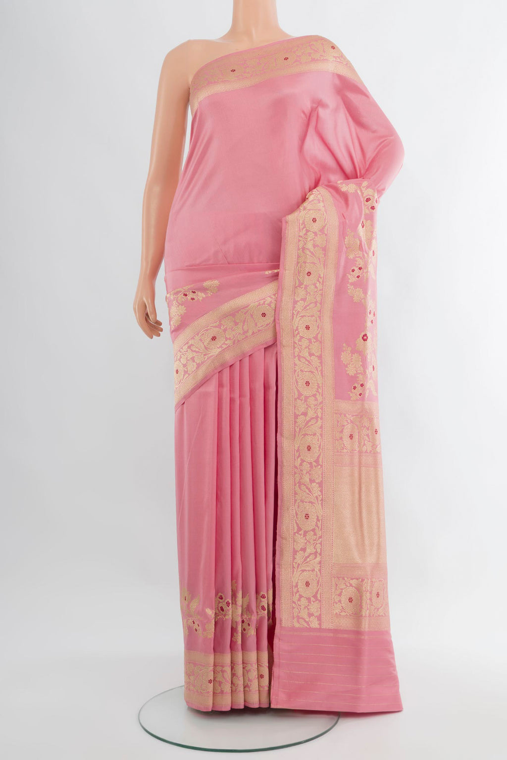 Rose pink Banarasi Silk Saree with Plain Body and Fancy Border.  displayed on a mannequin