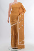 Sandal Banarasi Katan Silk Saree with Zari Butta on the body and Silk Border.  displayed on a mannequin