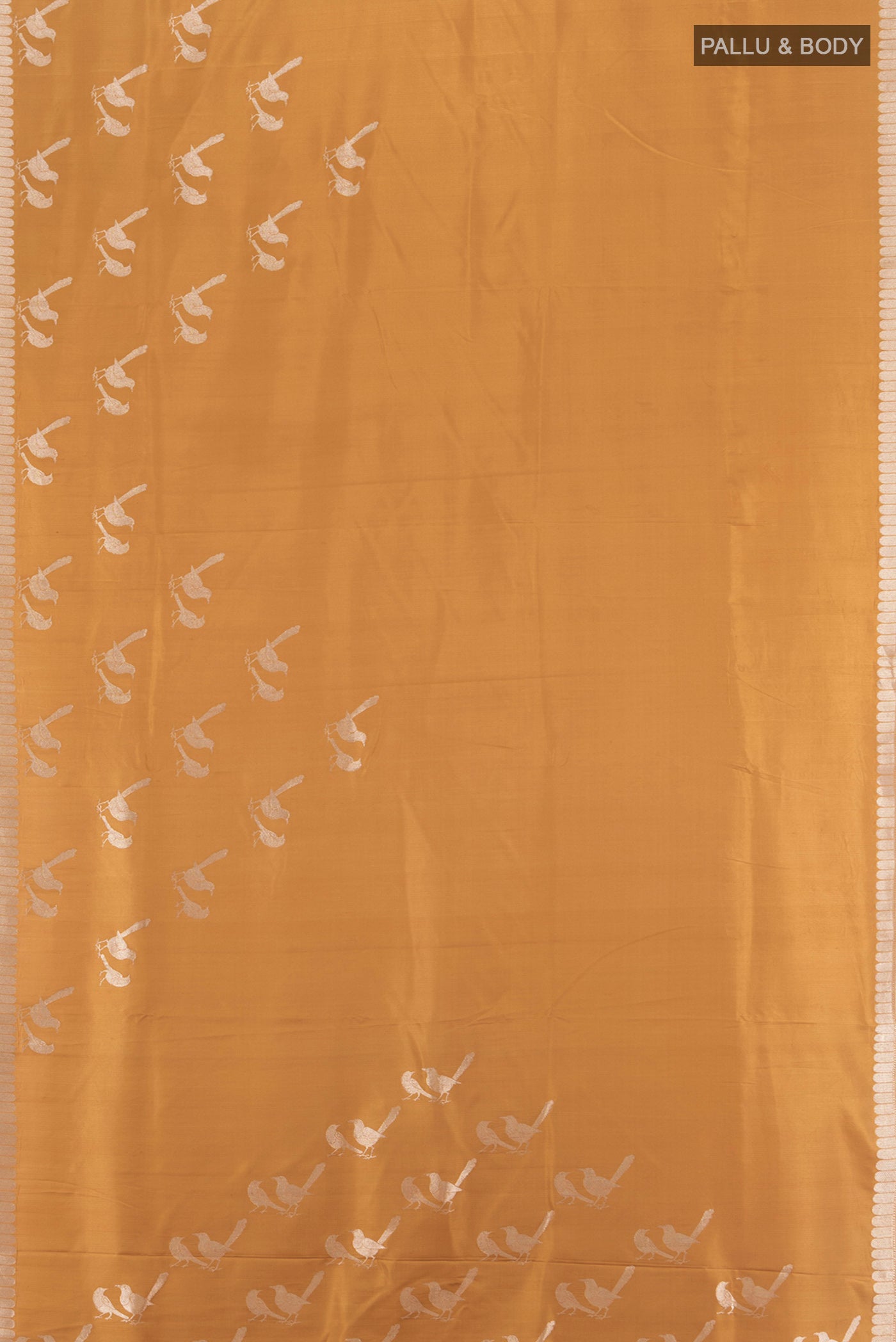 Flat view of Sandal Banarasi Katan Silk Saree with Zari Butta on the body and Silk Border. 