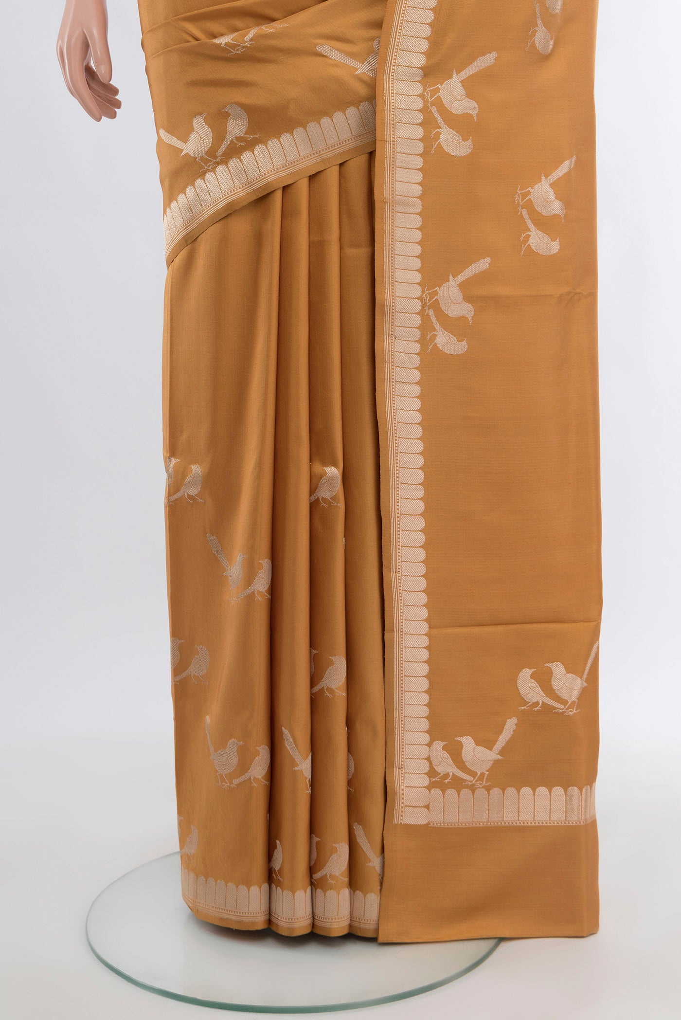 Pleats and pallu of Sandal Banarasi Katan Silk Saree with Zari Butta on the body and Silk Border. 